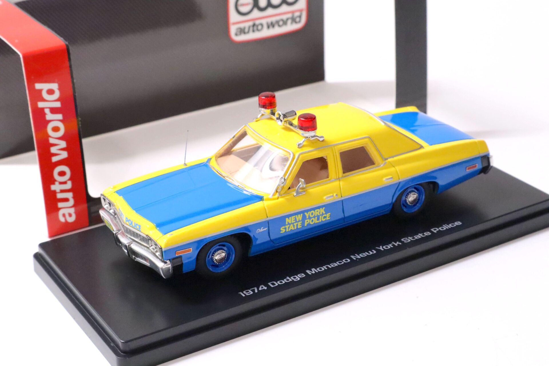 1:43 Auto World 1974 Dodge Monaco New York State Police blue/ yellow