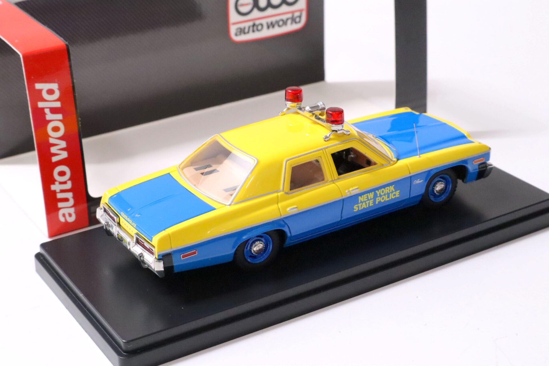 1:43 Auto World 1974 Dodge Monaco New York State Police blue/ yellow