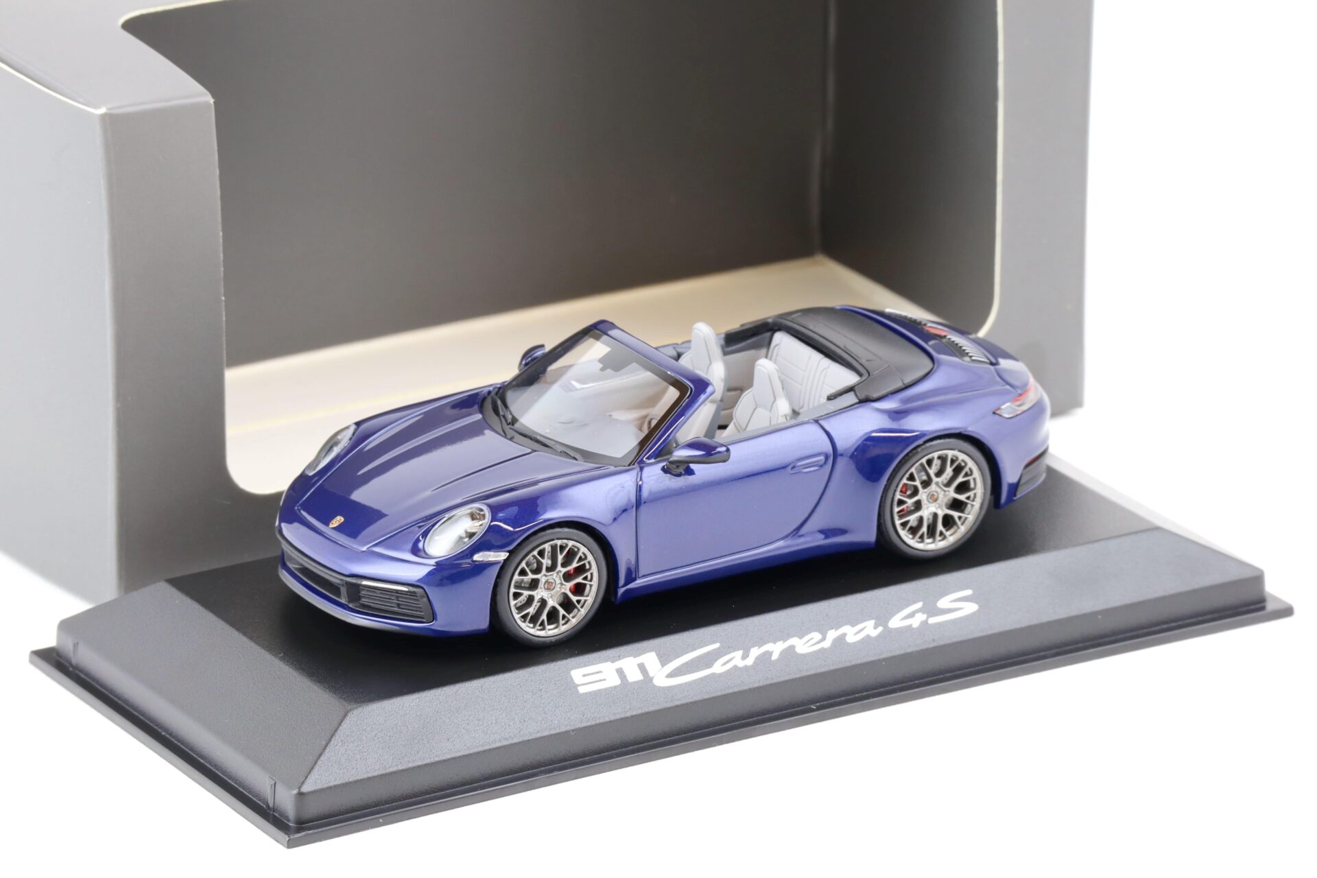 ID 75107 orig.jpg 1:43 Minichamps Porsche 911 (992) Carrera 4S Cabriolet Enzian blue DEALER WAP