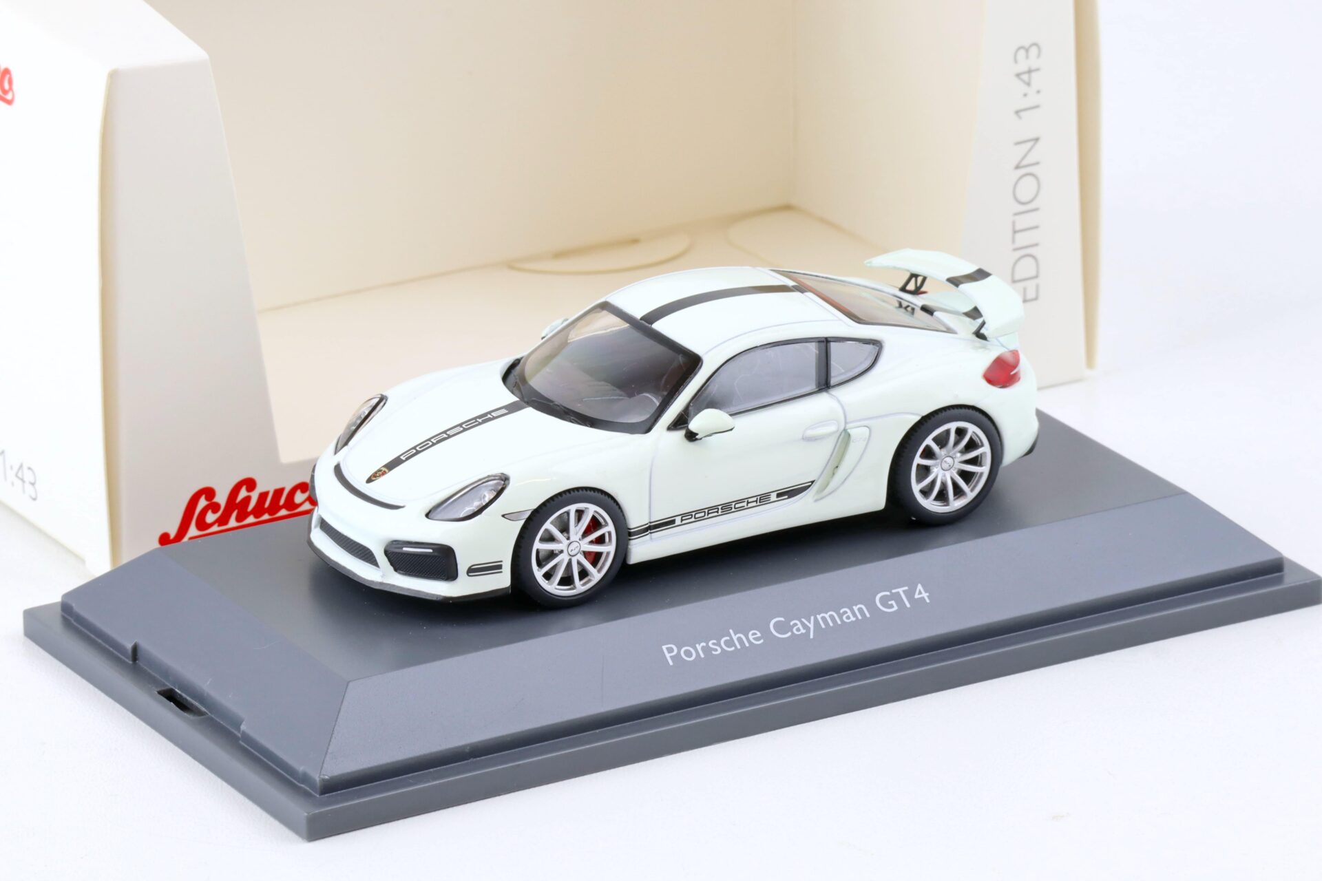 ID 79218 orig.jpg 1:43 Schuco Porsche Cayman GT4 Coupe white/ black stripes