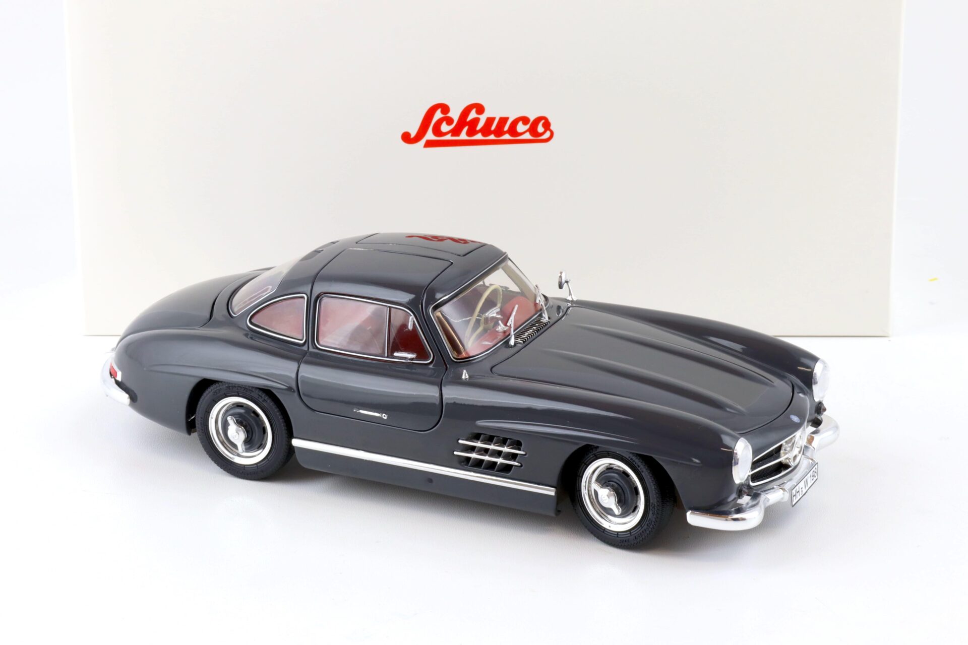 1:18 Schuco Mercedes 300 SL Coupe Gullwing grey/ red interior
