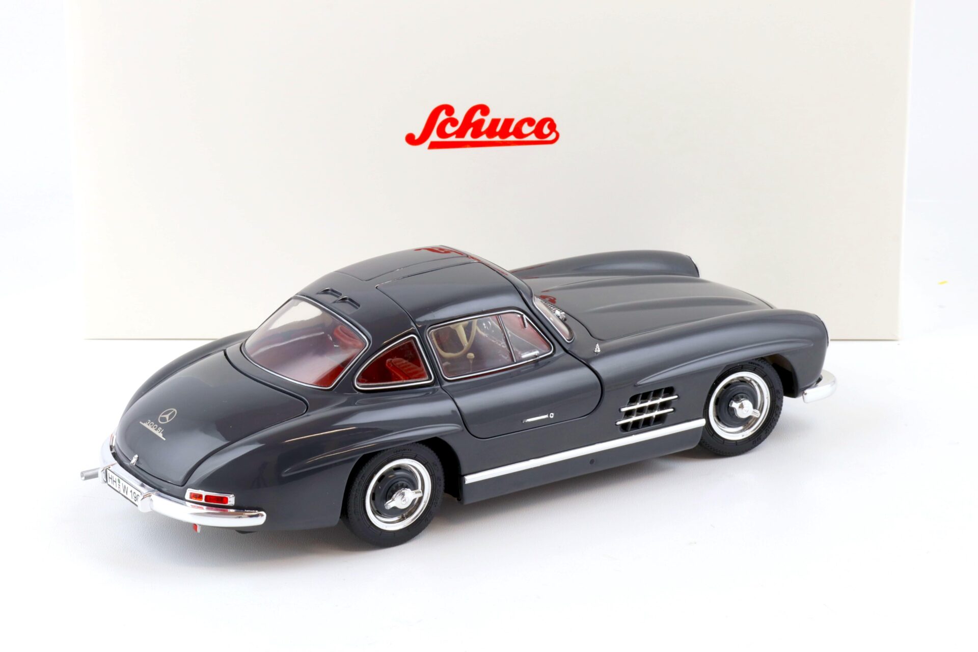 1:18 Schuco Mercedes 300 SL Coupe Gullwing grey/ red interior