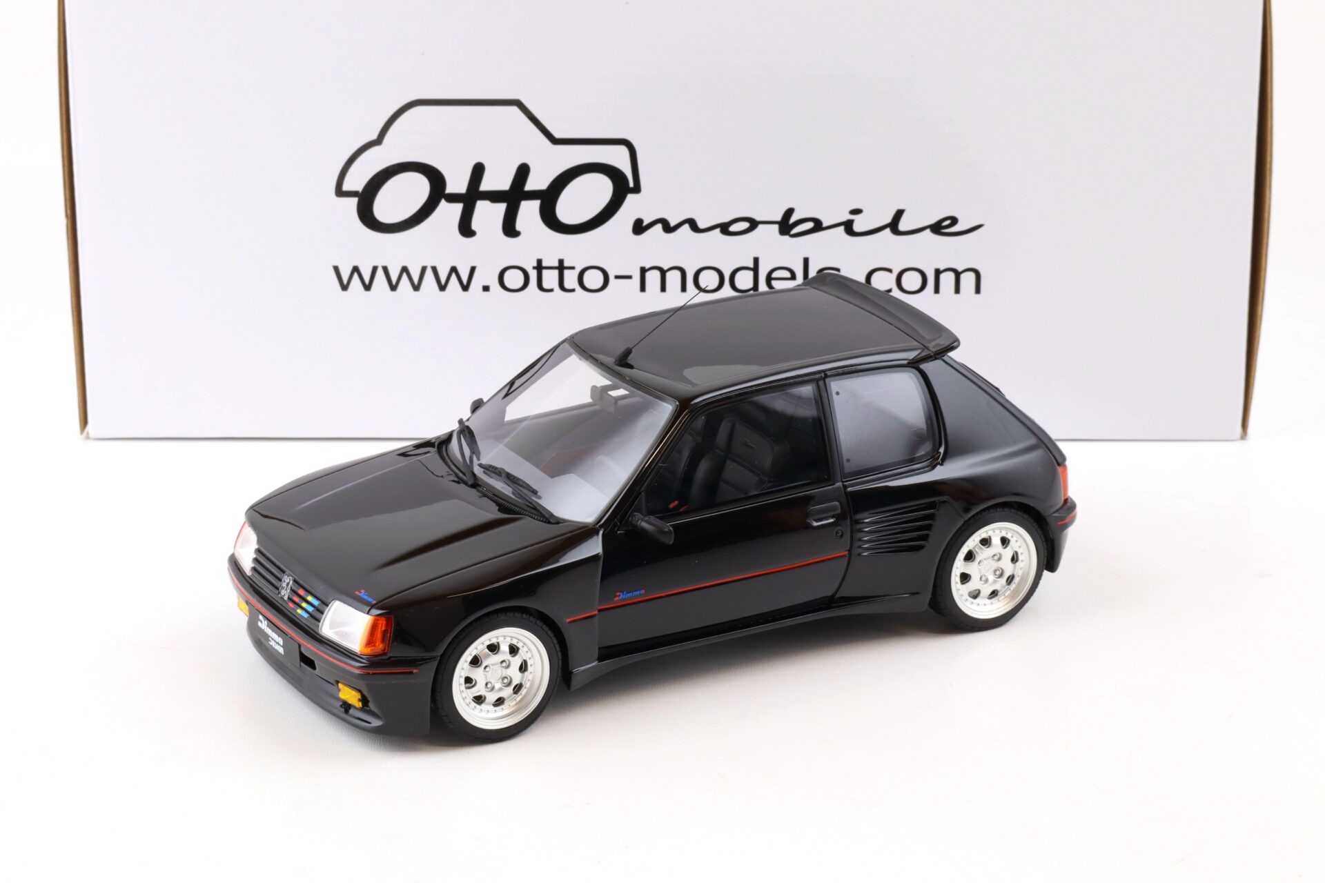 1:18 OTTO mobile OT817 Peugeot 205 Dimma Edition 1 black/ silver wheels