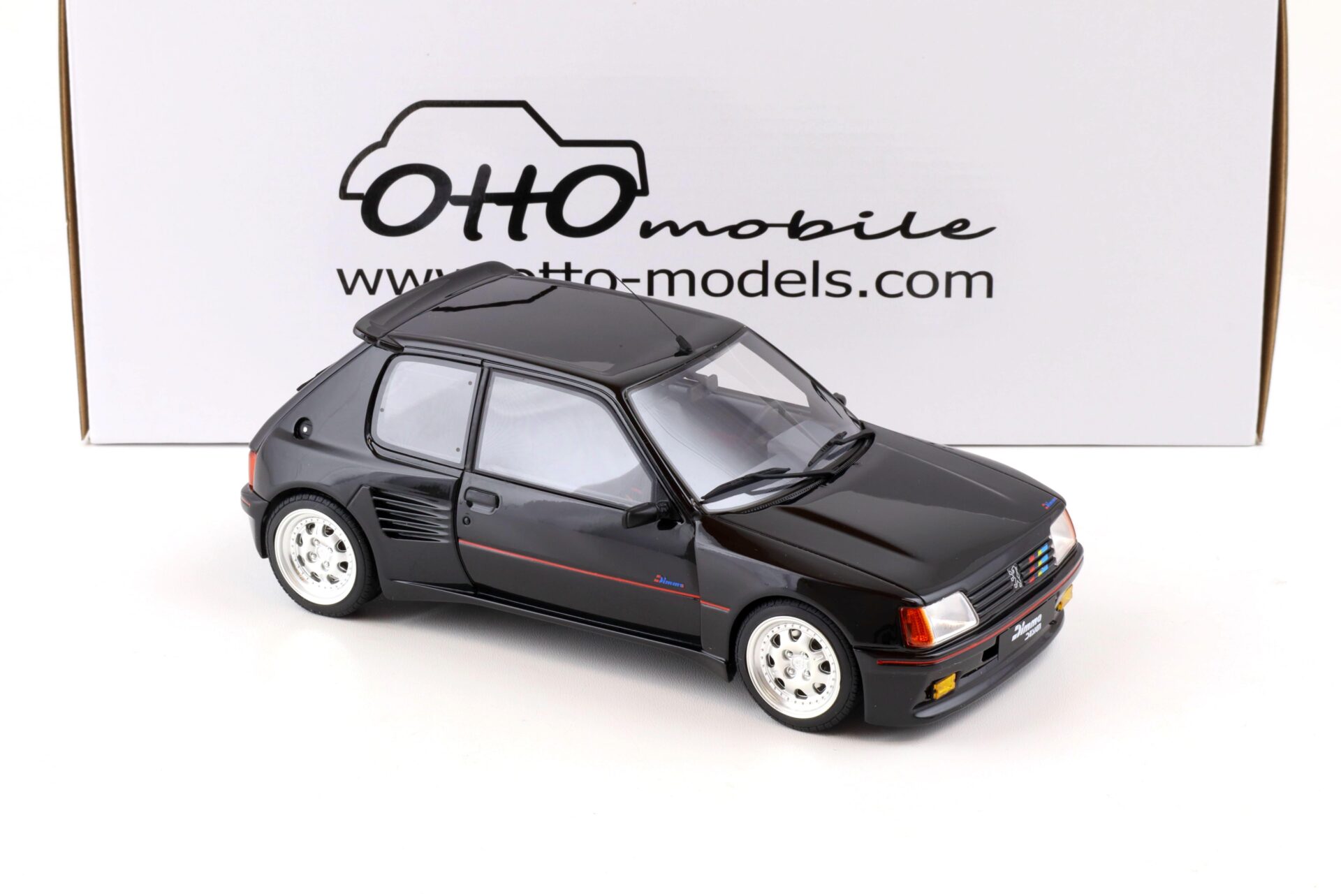1:18 OTTO mobile OT817 Peugeot 205 Dimma Edition 1 black/ silver wheels