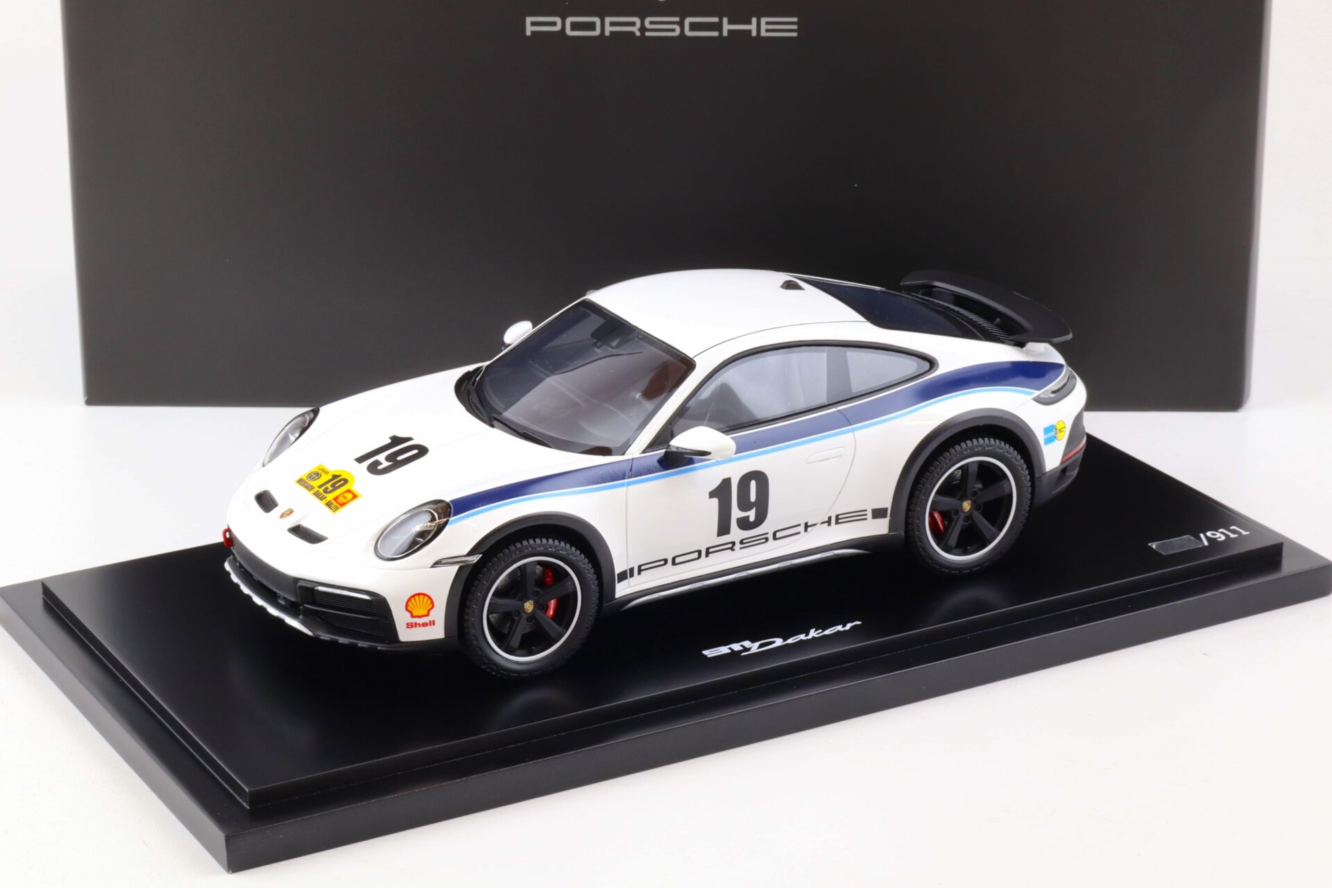 1:18 Spark Porsche 911 (992) Dakar Rallye 1974 Design Kühne & Nagel WAP DEALER