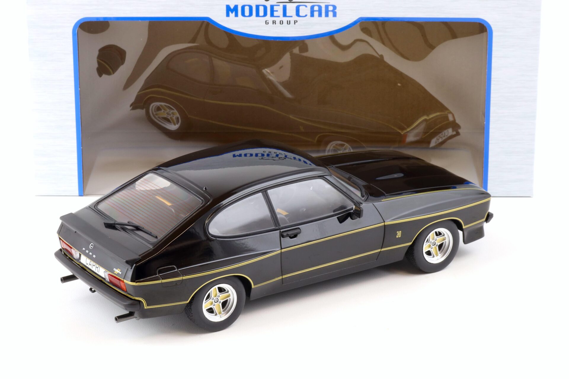 1:18 MCG Ford Capri MK II X-Pack black/ gold stripes LHD 1975