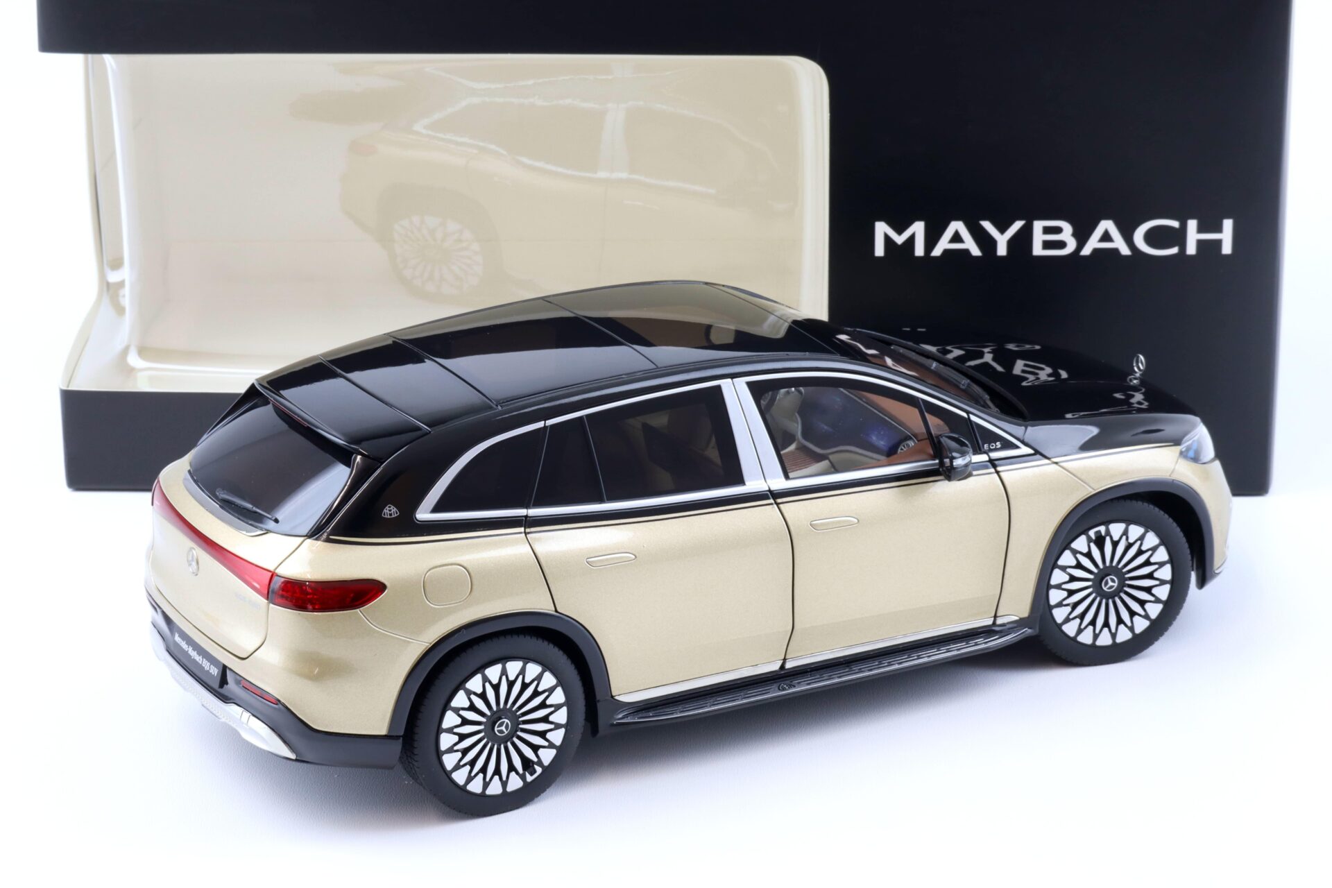 1:18 NZG Mercedes Maybach EQS 680 SUV black/ Kalahari gold DEALER VERSION