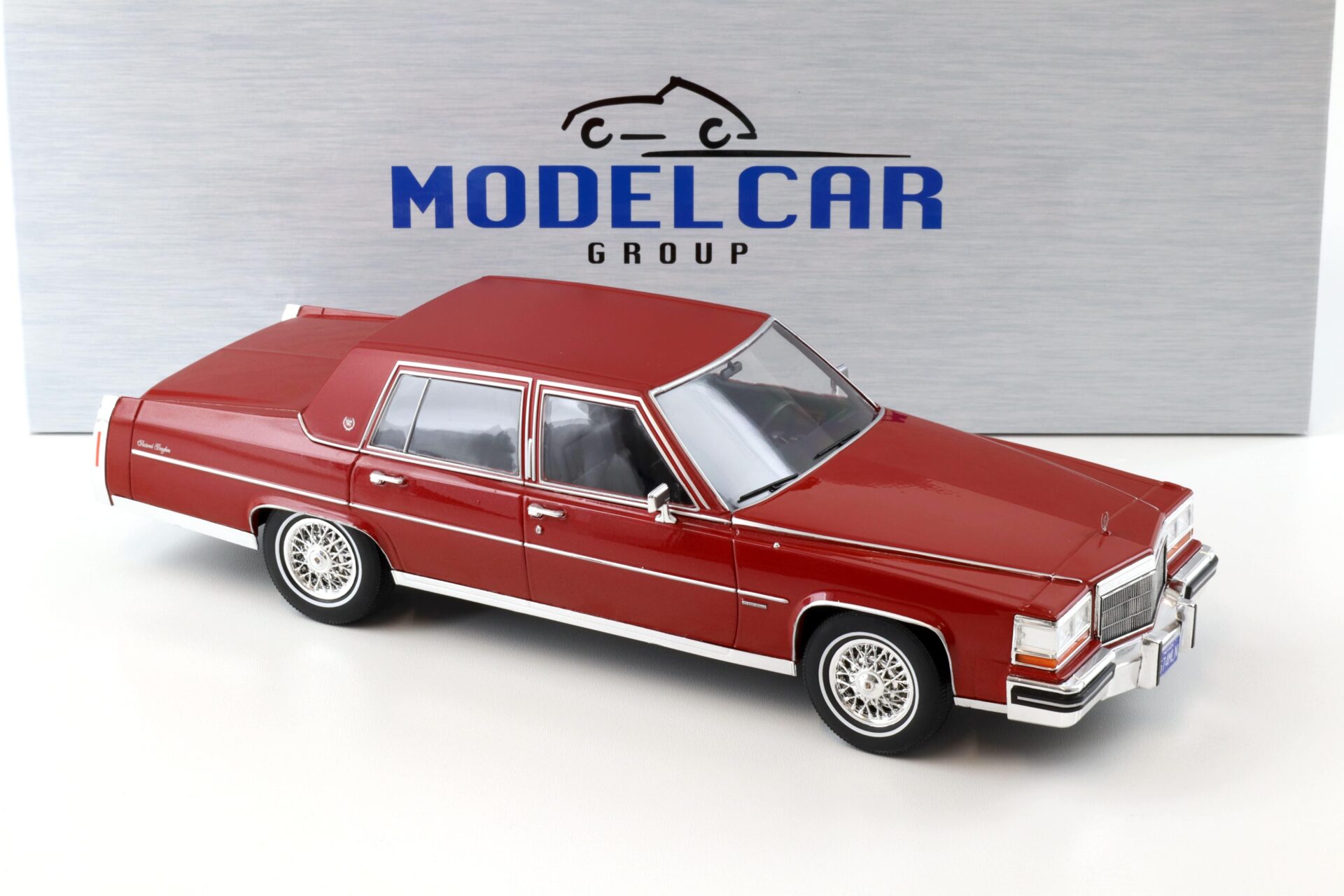 1:18 MCG 1982 Cadillac Fleetwood Brougham dark red metallic