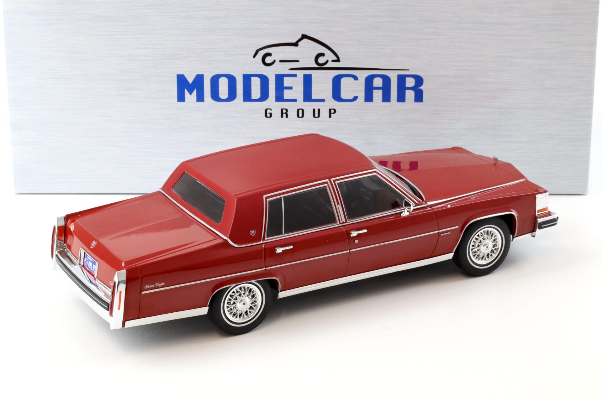 1:18 MCG 1982 Cadillac Fleetwood Brougham dark red metallic