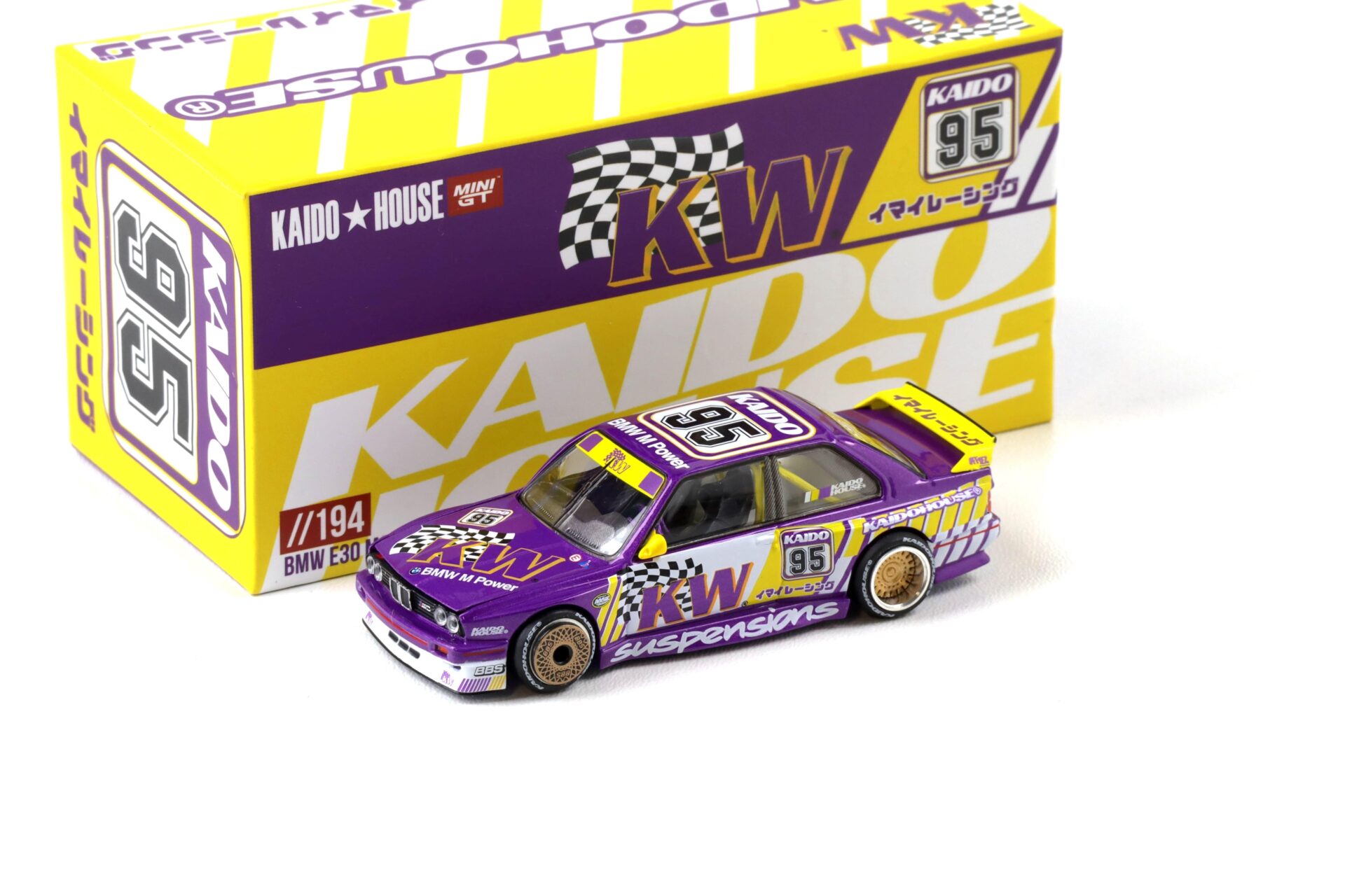 1:64 TSM Mini GT Kaido House BMW M3 E30 Kaido KW V1 purple/ yellow 1989