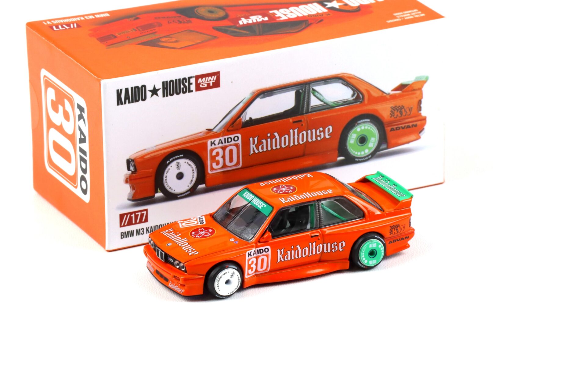 1:64 TSM Mini GT Kaido House BMW M3 E30 Kaidohouse V1 orange 1989