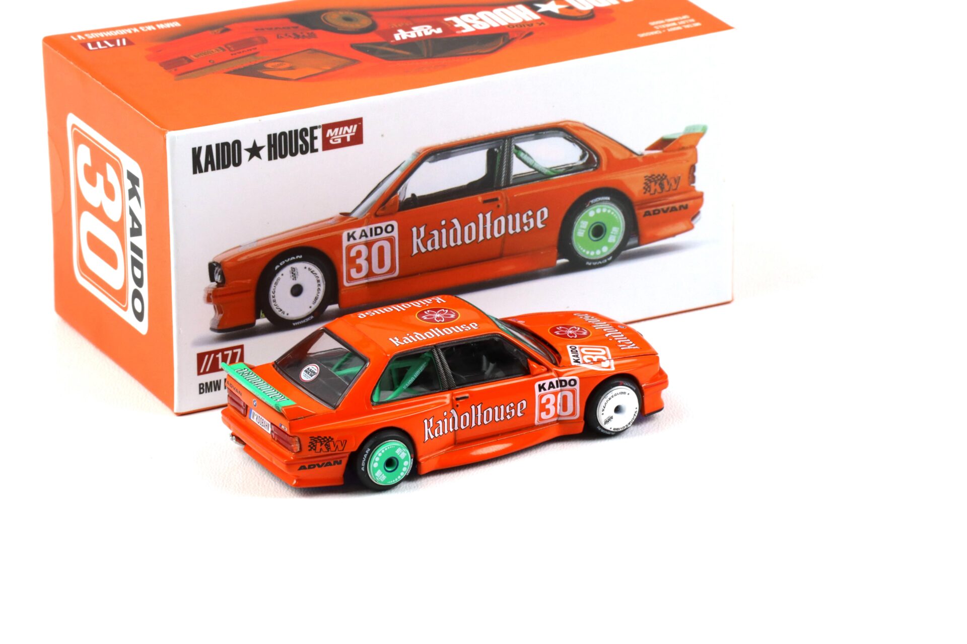 1:64 TSM Mini GT Kaido House BMW M3 E30 Kaidohouse V1 orange 1989