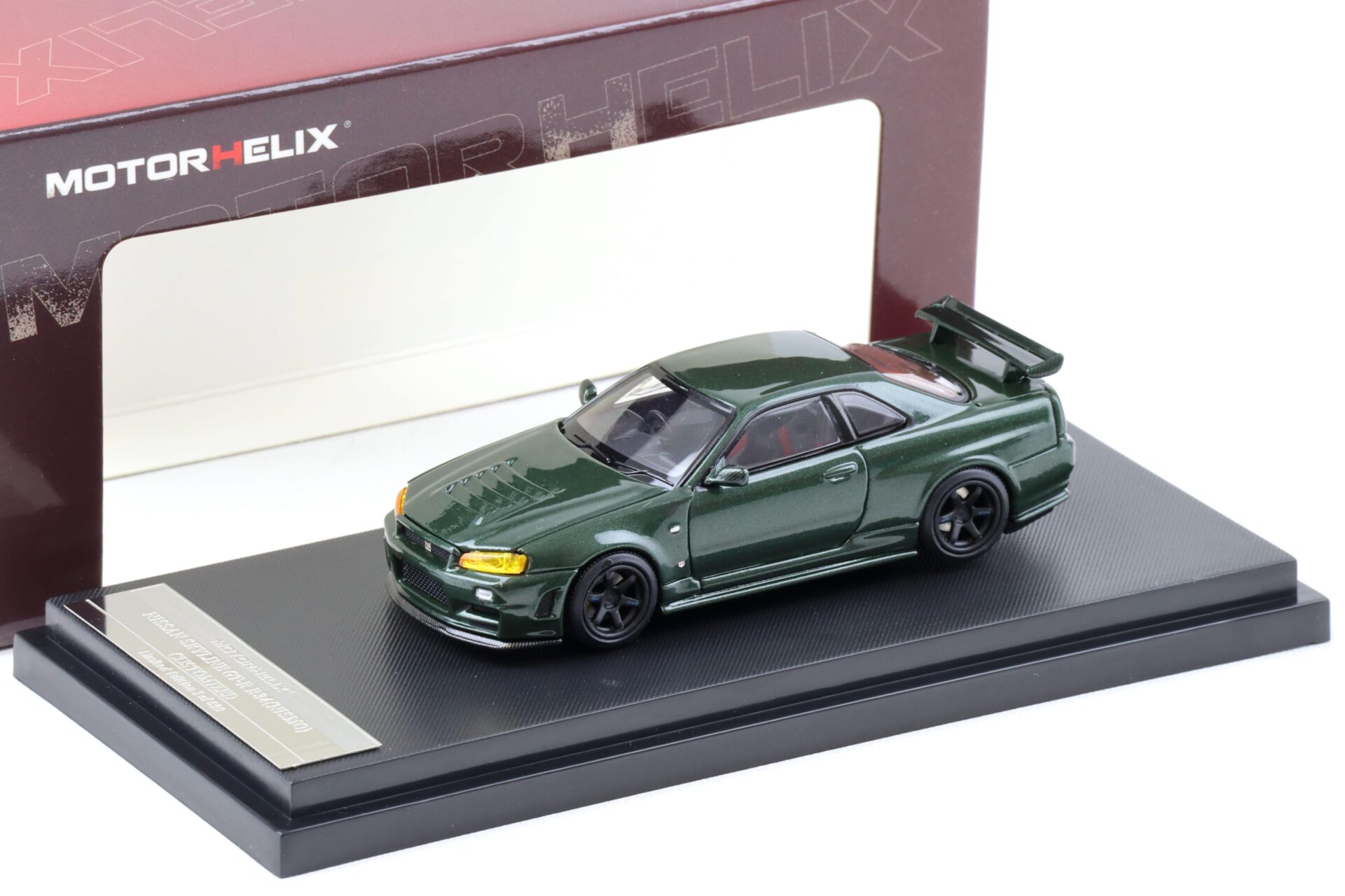 1:64 Motorhelix Nissan Skyline GT-R R34 Nismo CRS dark green M63421