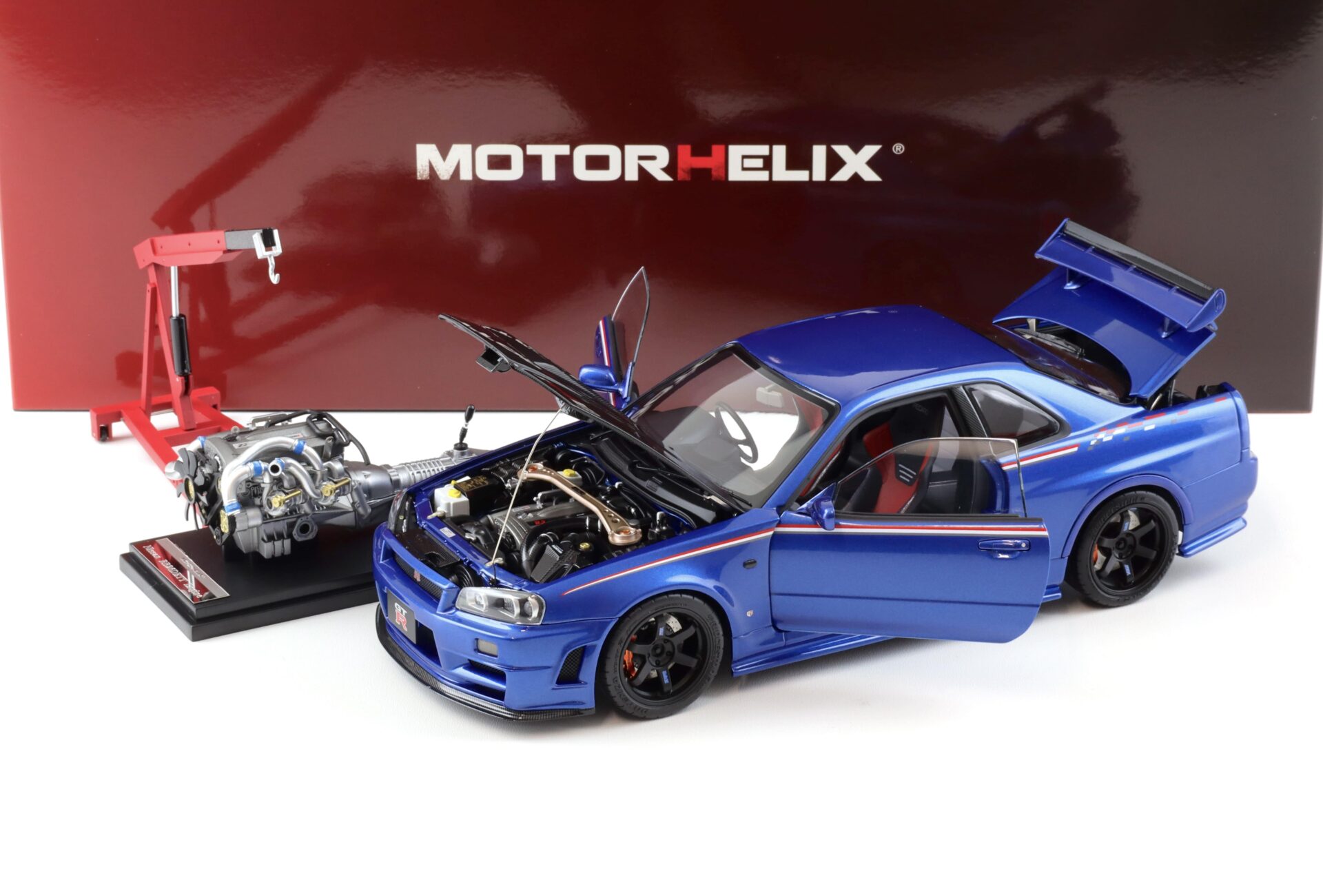 1:18 Motorhelix Nissan Skyline GT-R R34 Nismo CRS Bayside blue/ Carbon hood M83430
