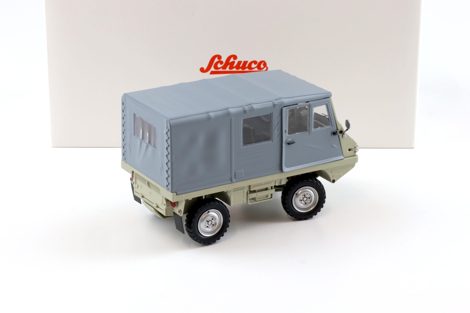 1:18 Schuco Styr-Puch Halfinger 4x4 beige/ grey