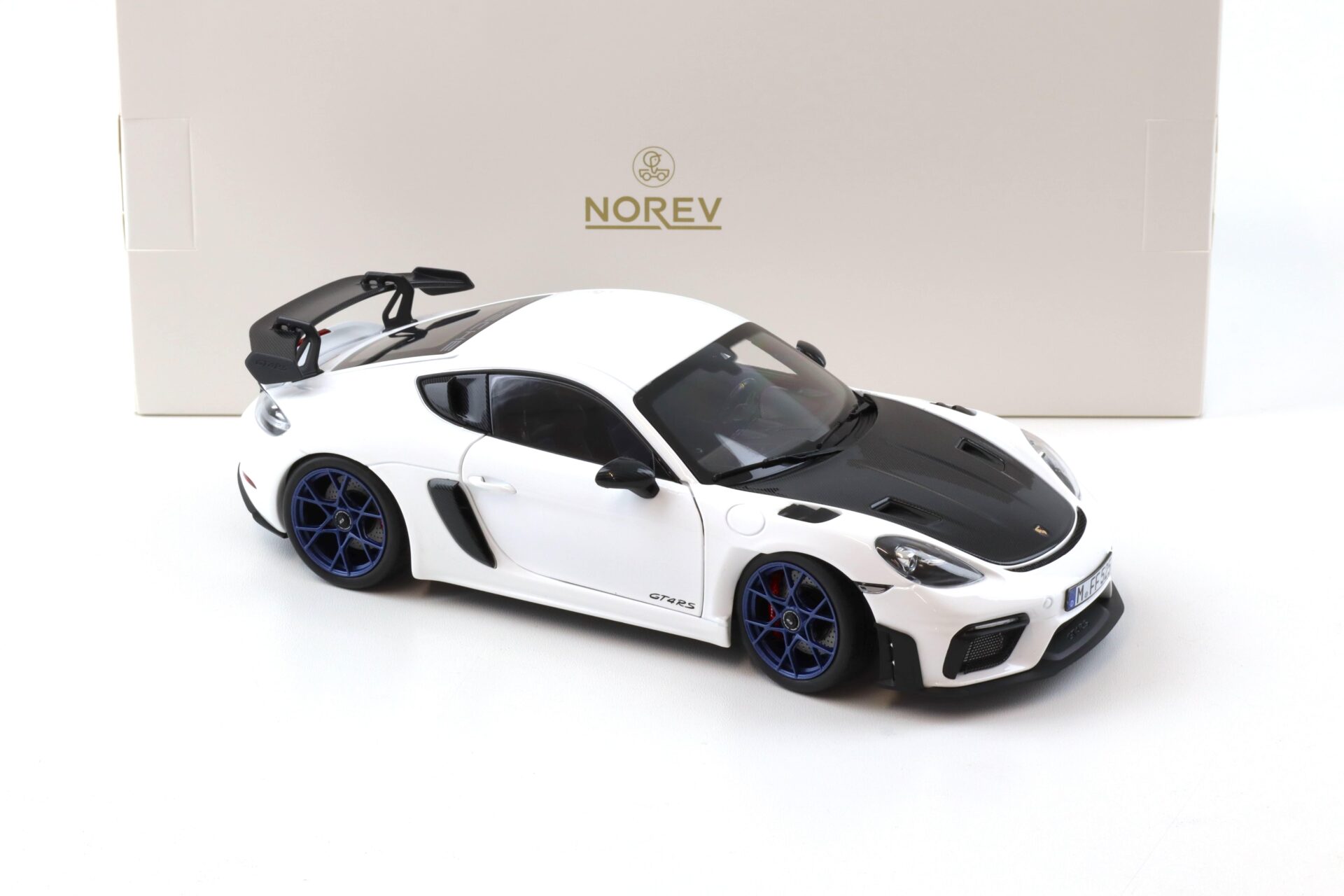 1:18 Norev ASIA Exclusive Porsche Cayman GT4 RS Weissach Package white/ indigo blue