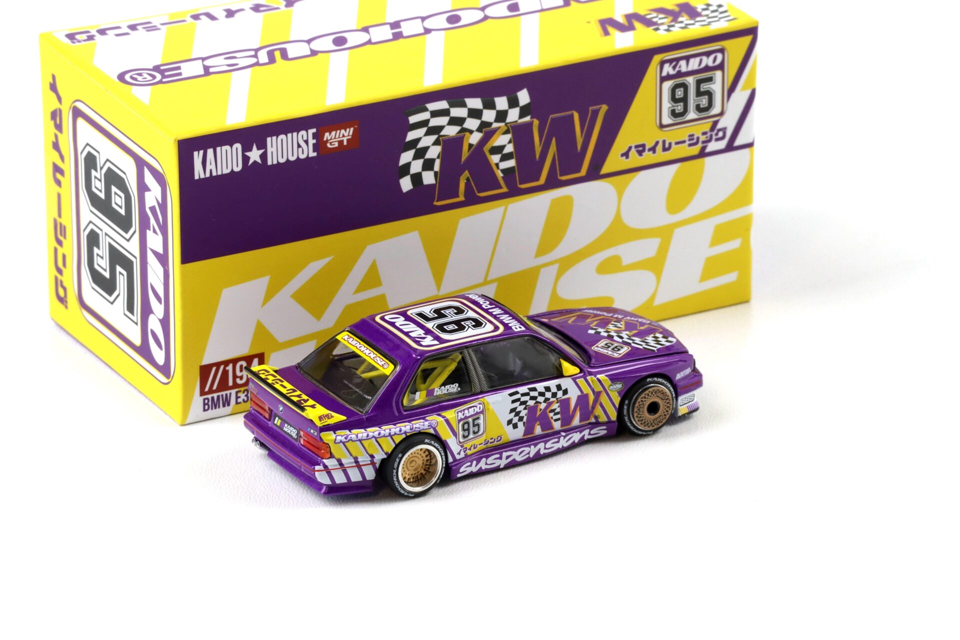 1:64 TSM Mini GT Kaido House BMW M3 E30 Kaido KW V1 purple/ yellow 1989