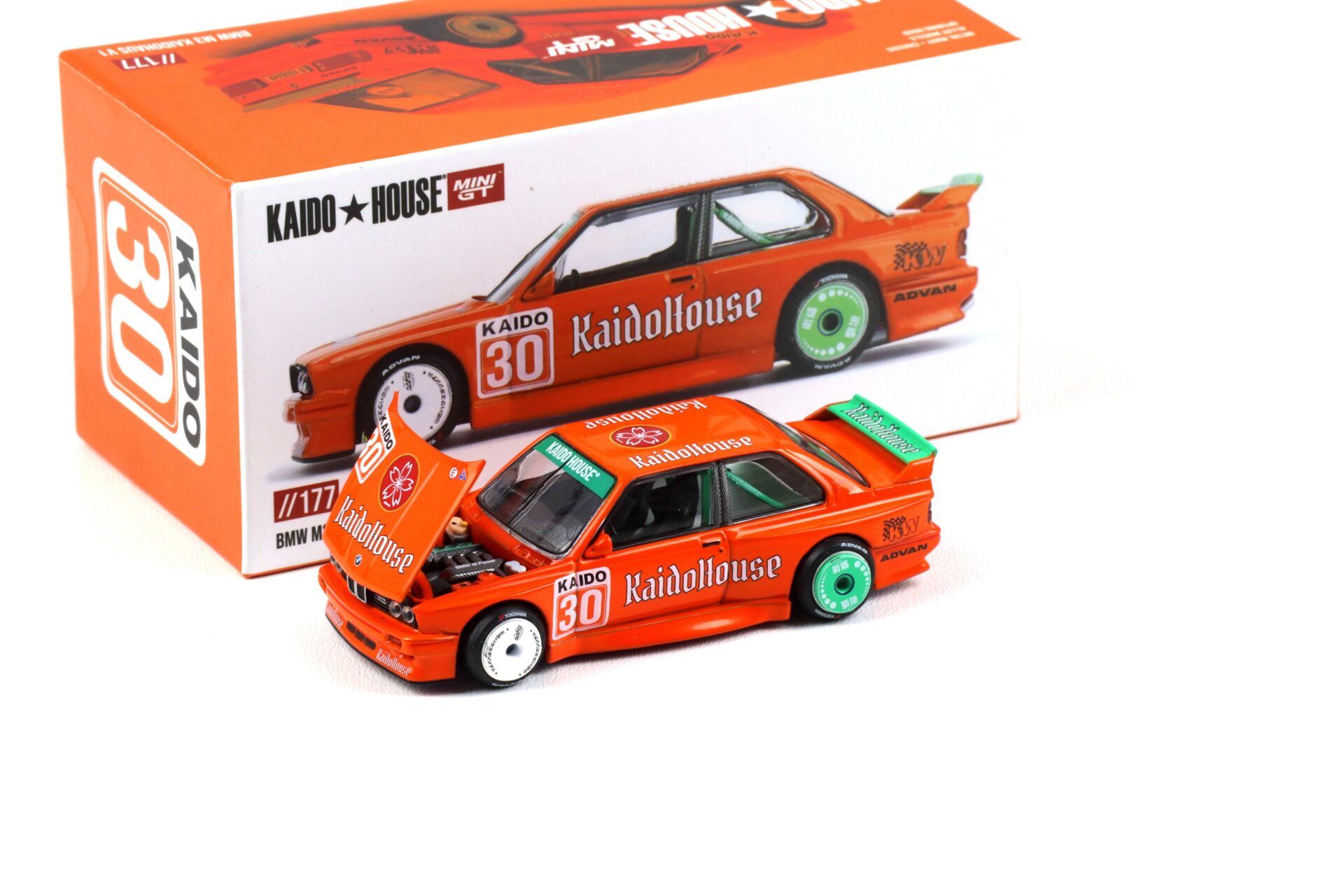 1:64 TSM Mini GT Kaido House BMW M3 E30 Kaidohouse V1 orange 1989