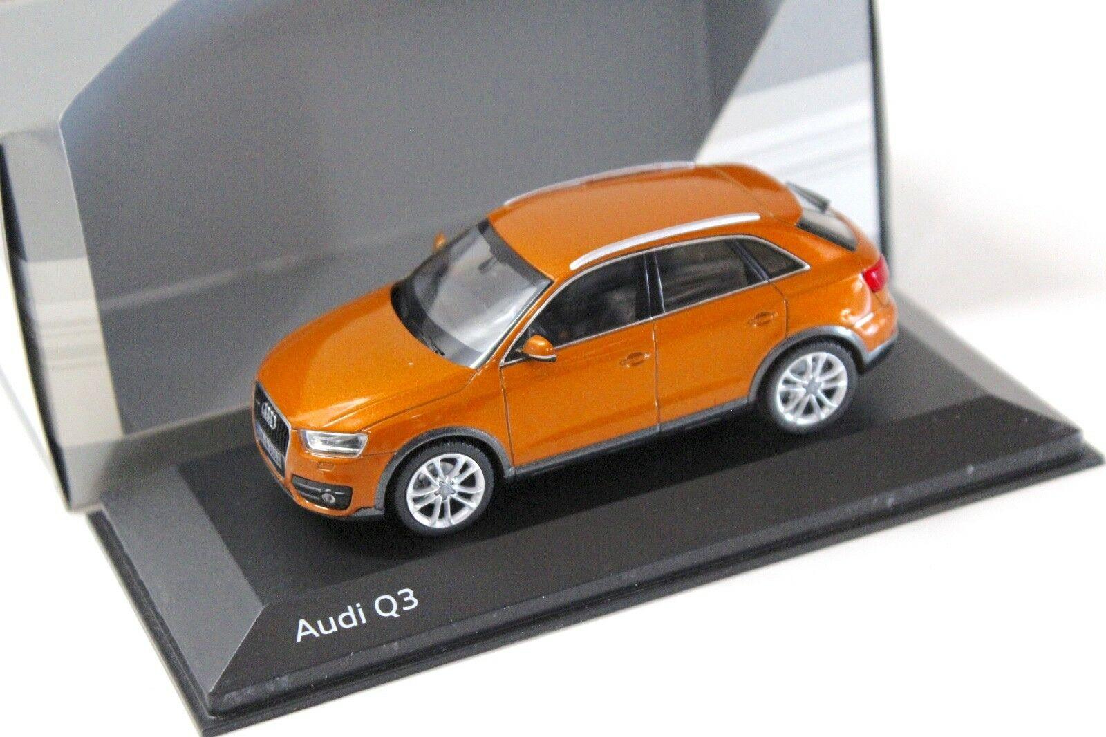 ID 34991 orig.jpg 1:43 Schuco Audi Q3 Samoa orange 2011 DEALER VERSION