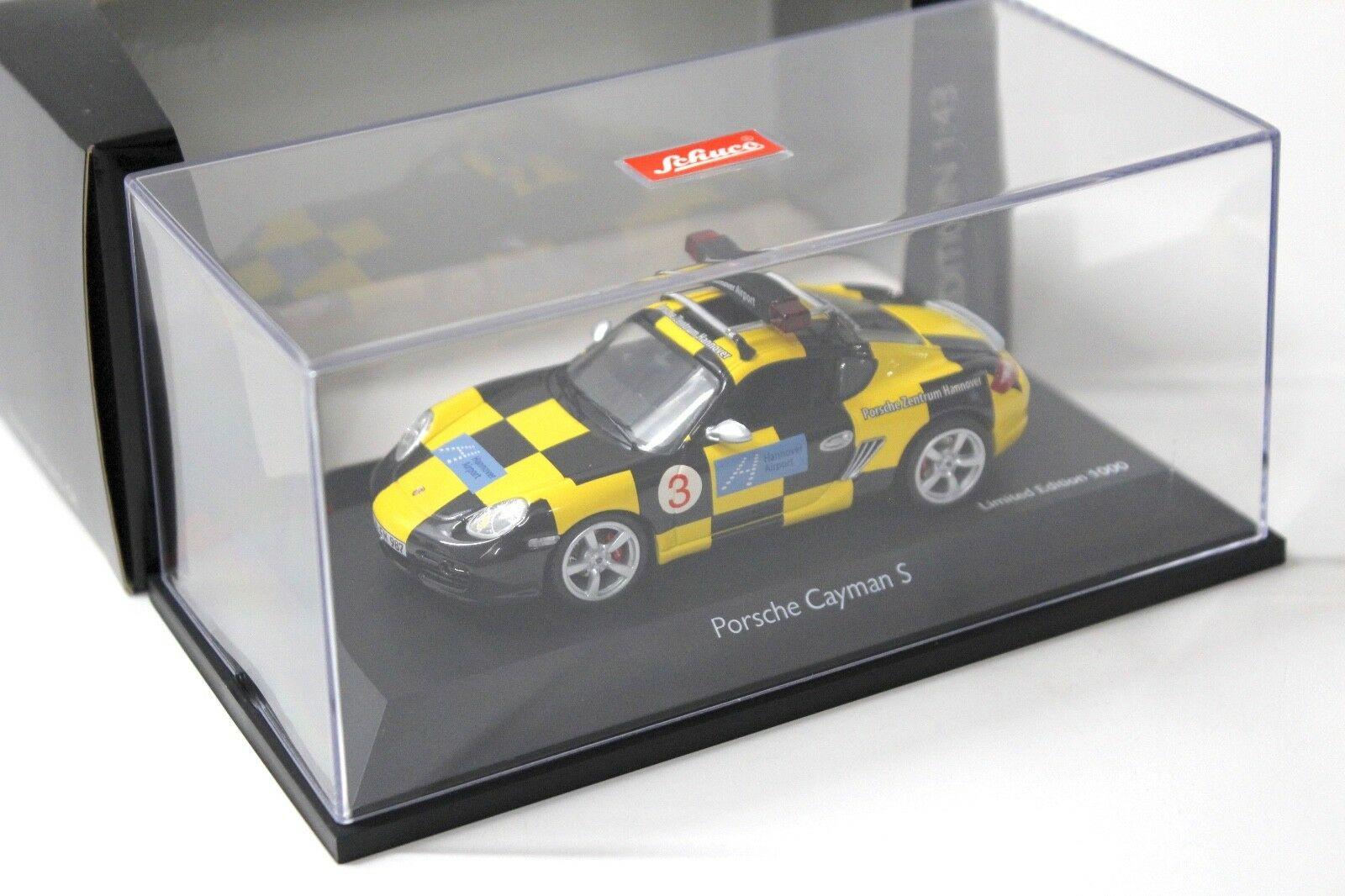 1:43 Schuco Porsche Cayman S "FOLLOW ME" Airport Hannover