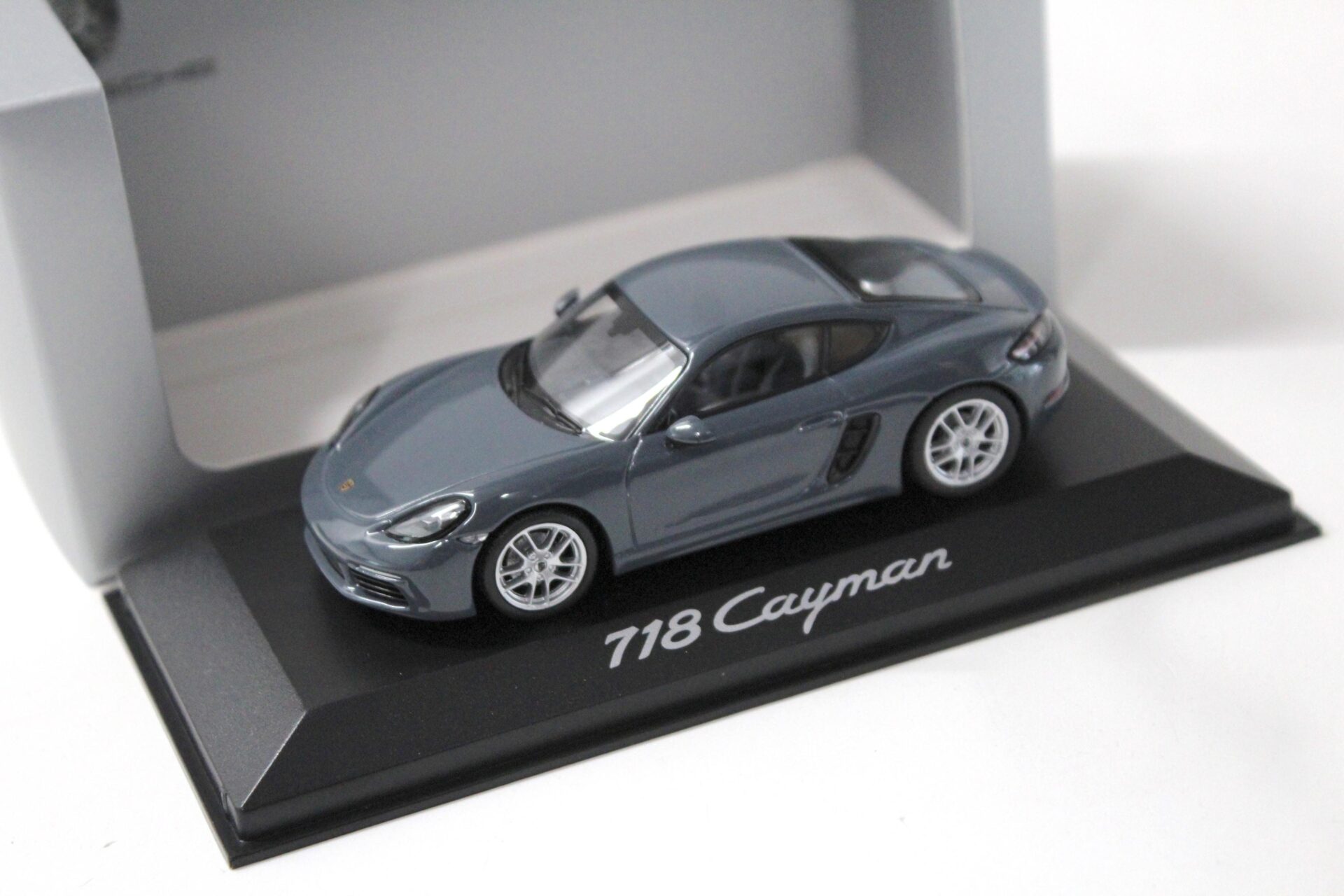 1:43 Minichamps Porsche 718 Cayman 2016 graphite blue metallic DEALER VERSION