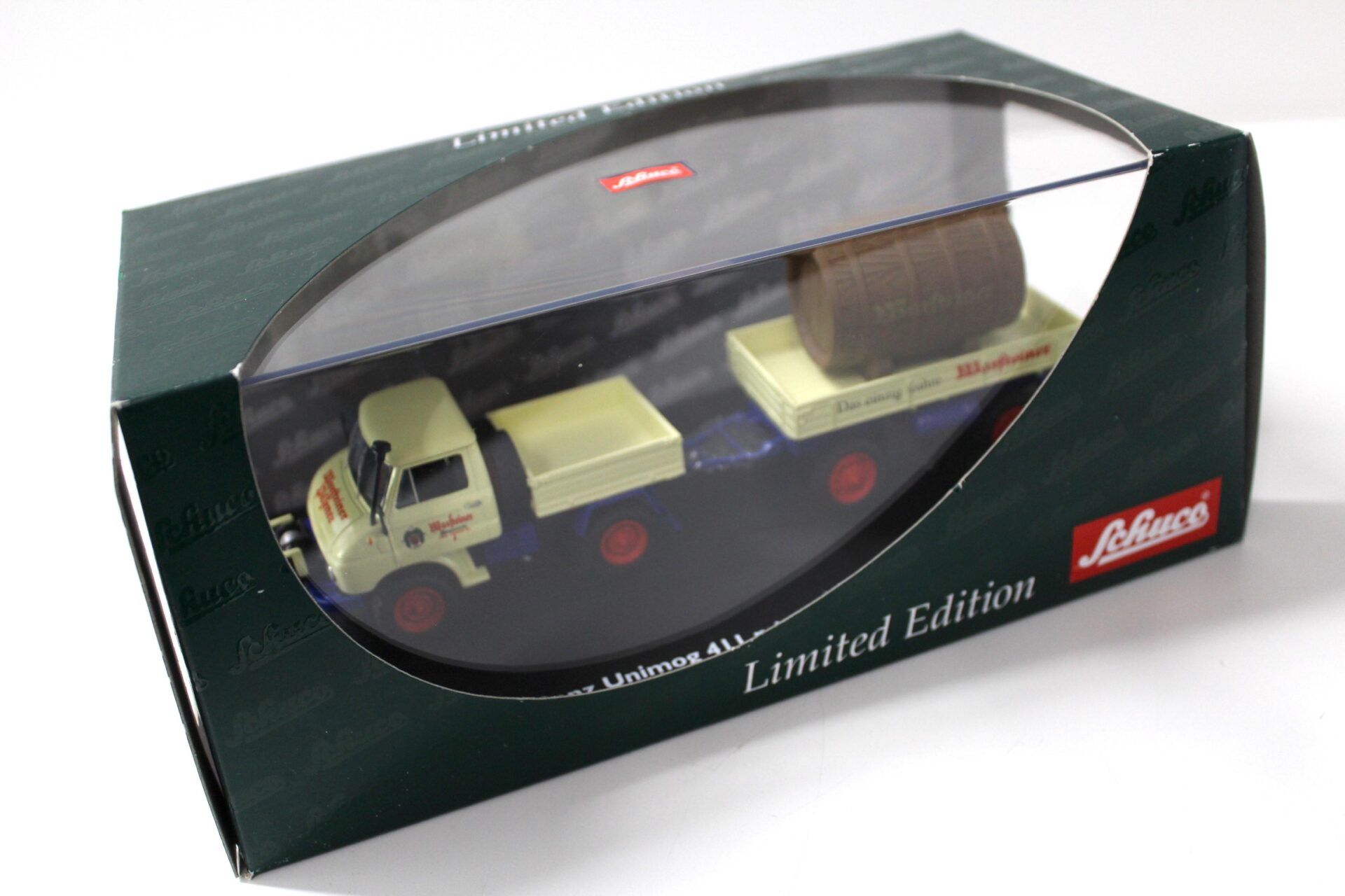 1:43 Schuco Mercedes Unimog 411 mit Anhänger Müller Mitteltal WARSTEINER