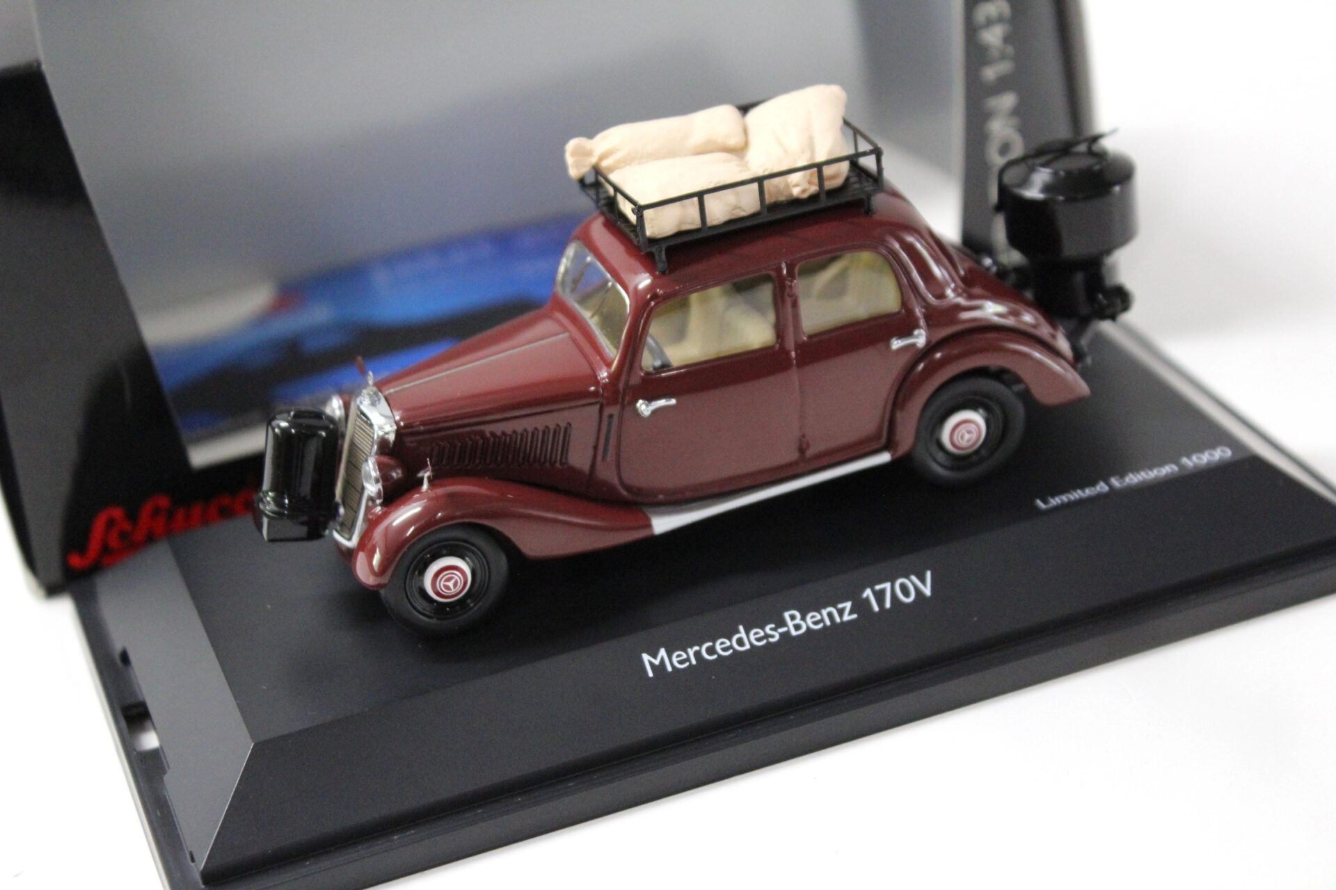 ID 45646 orig.jpg 1:43 Schuco Mercedes 170V Limousine mit Holzvergaser dark red