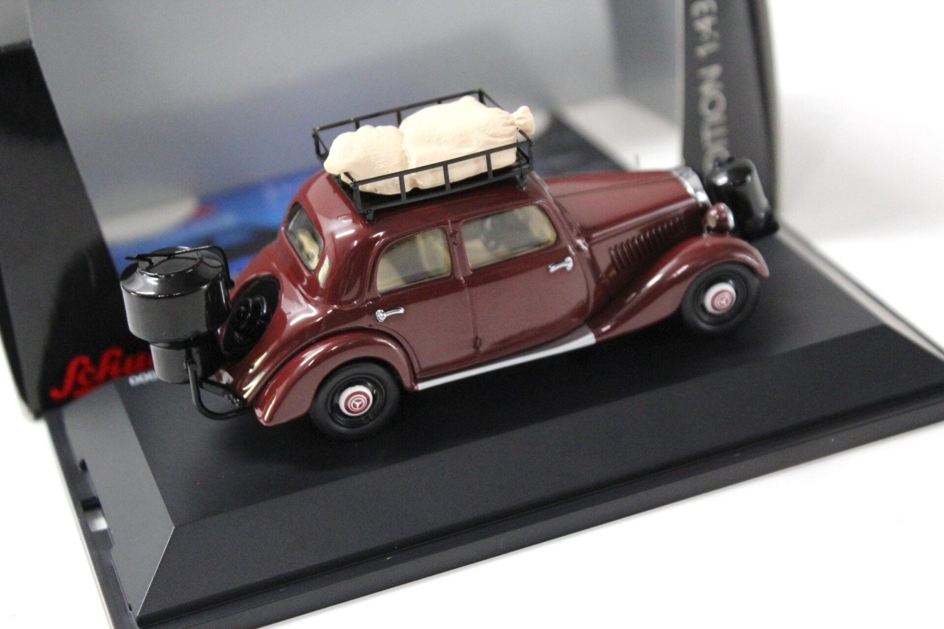 1:43 Schuco Mercedes 170V Limousine mit Holzvergaser dark red