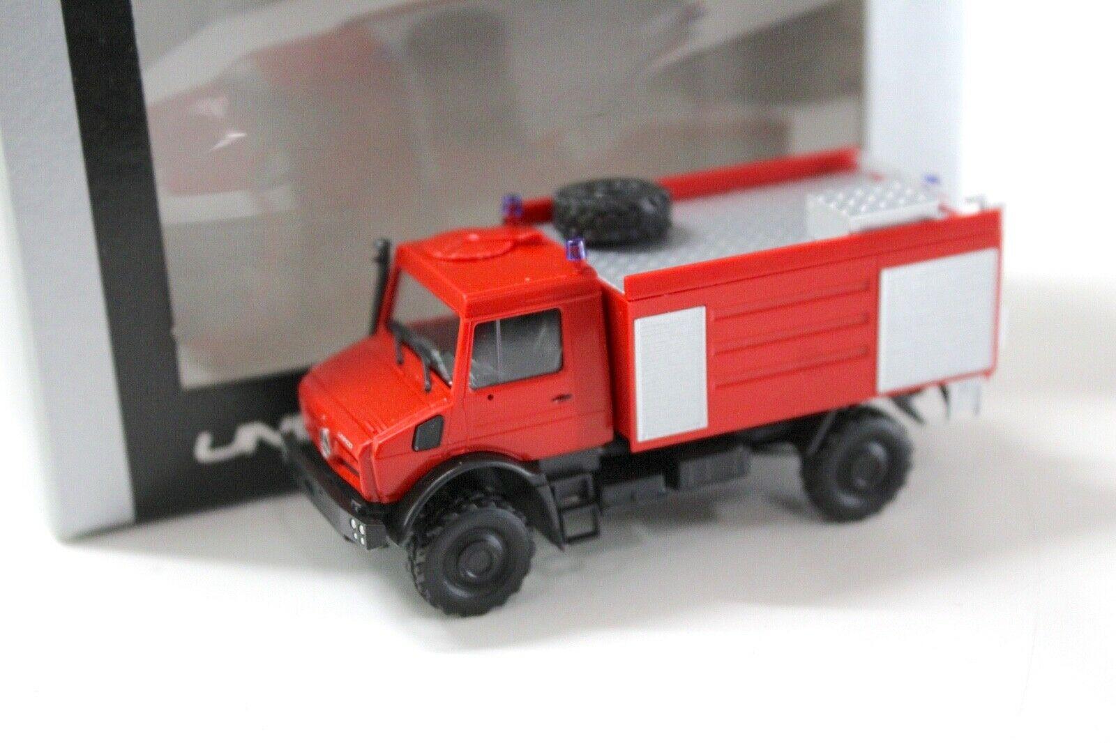 ID 49830 orig.jpg 1:87 Busch Mercedes Unimog U5023 Feuerwehr red DEALER VERSION