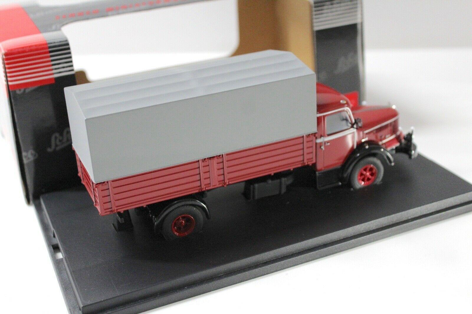 1:43 Schuco Krupp Titan Pritsche/ Plane red/ grey