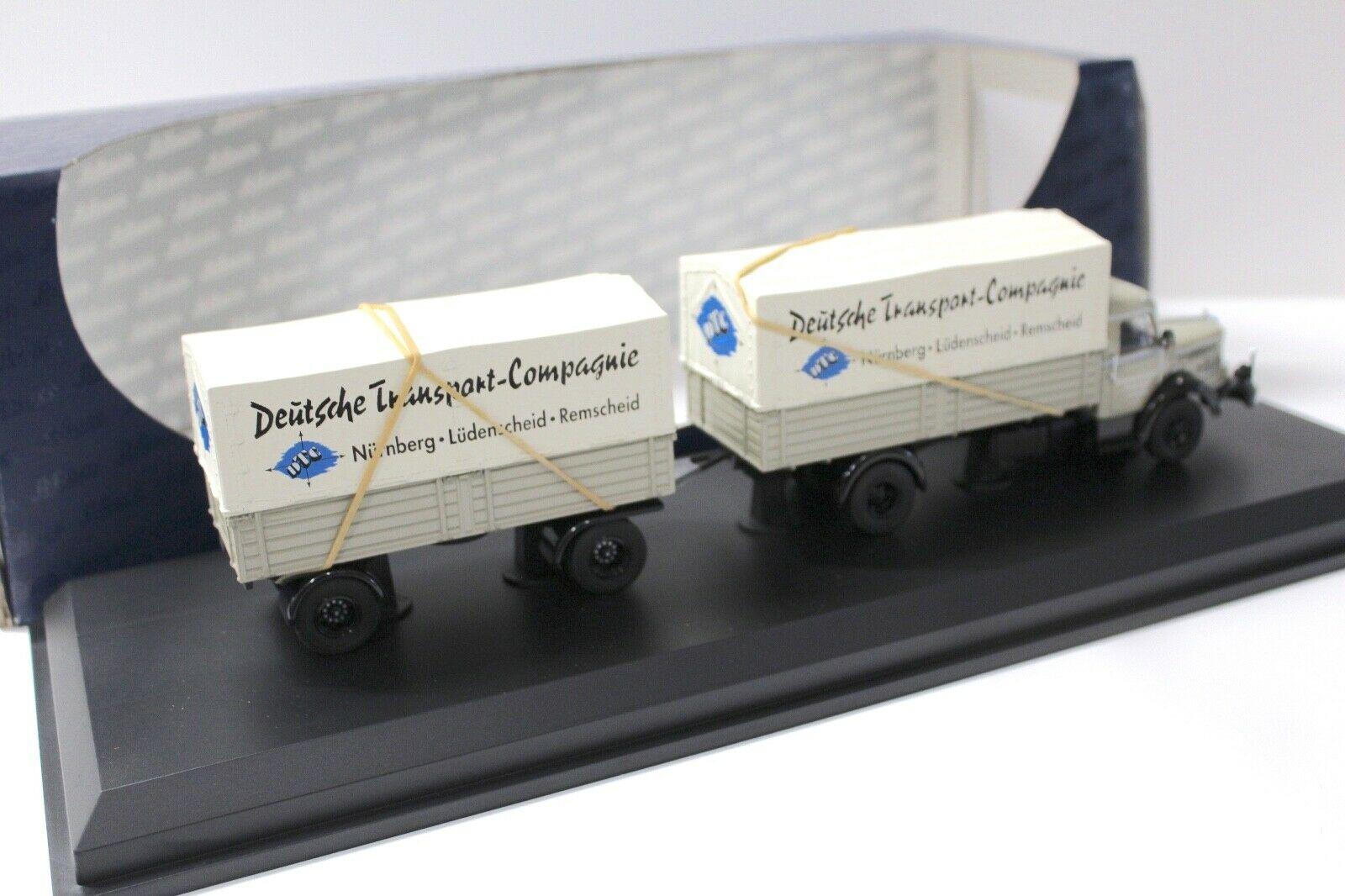 1:43 Schuco Krupp Titan Planen-LKW mit Anhänger DTC beige