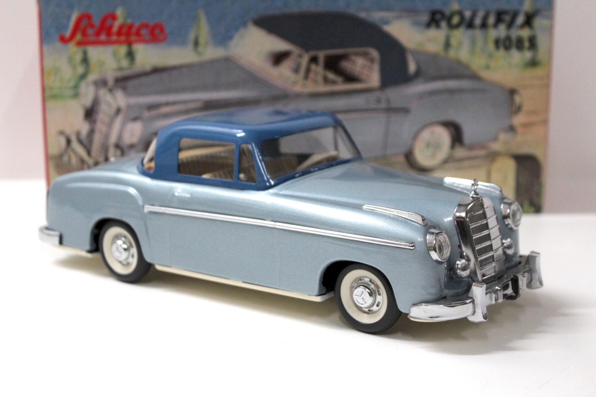 Schuco Rollfix 1085 Mercedes 220 S Ponton light blue metallic/ blue