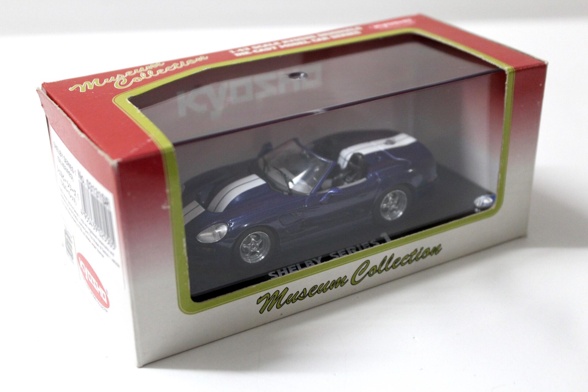 1:43 Kyosho Shelby Series 1 blue metallic/ white stripes