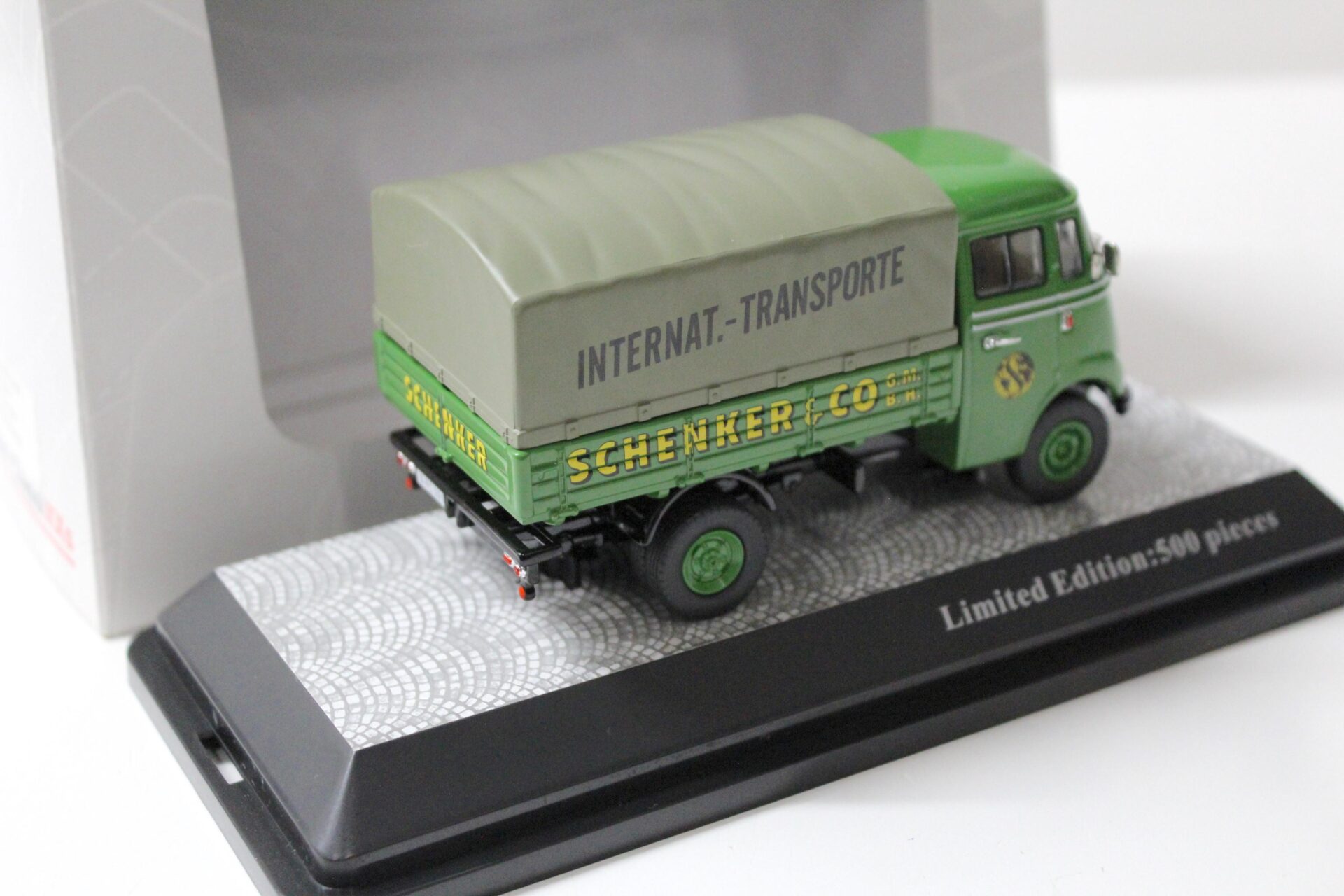 1:43 Premium ClassiXXs Mercedes L319 Pritsche/ Plane Schenkel green