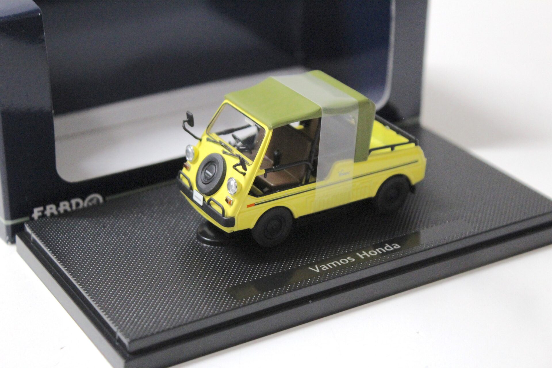 1:43 Ebbro Vamos Honda 4 yellow/ green Top 1970