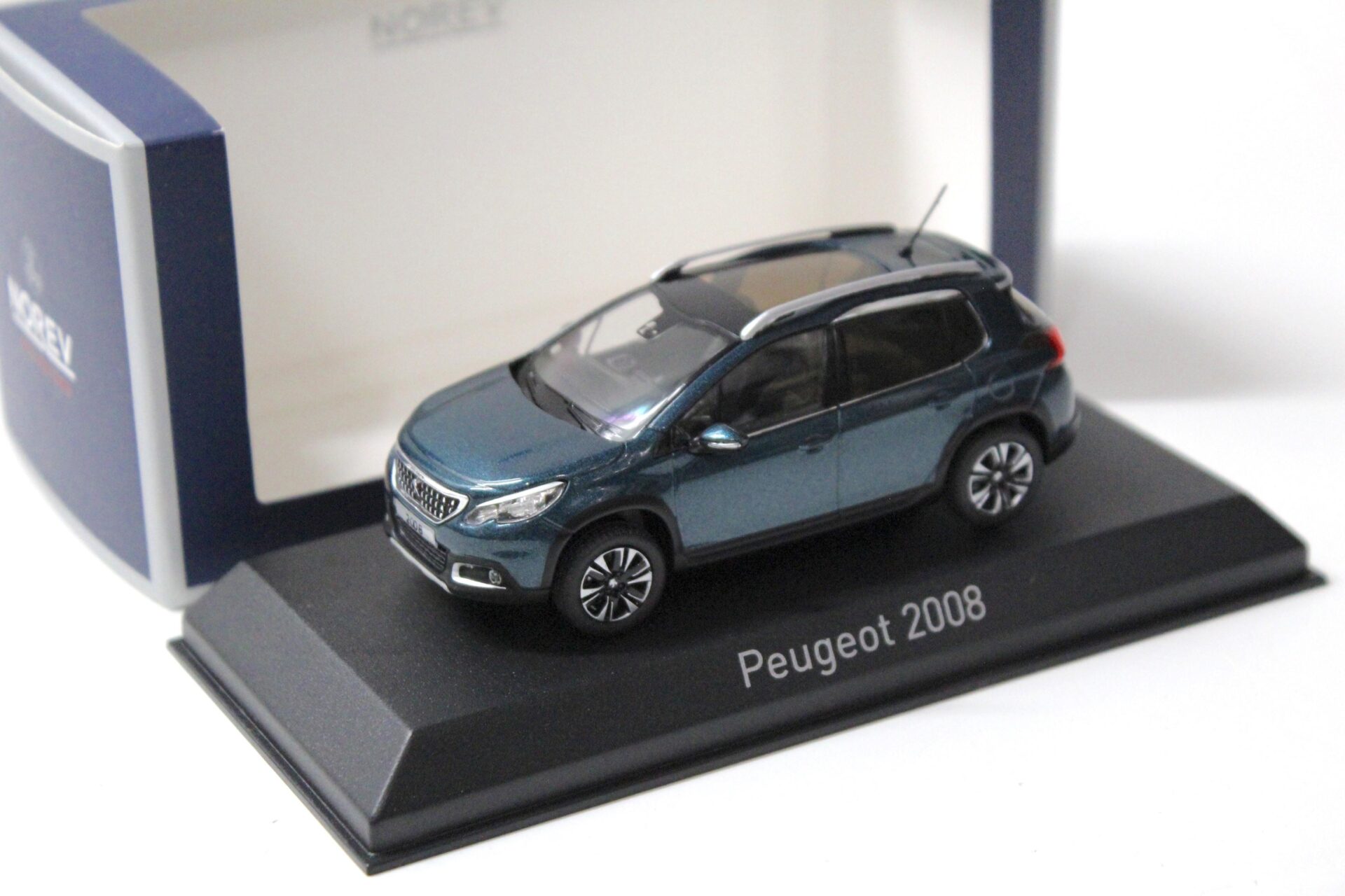 ID 56723 orig.jpg 1:43 Norev Peugeot 2008 Emerald Crystal blue 2016