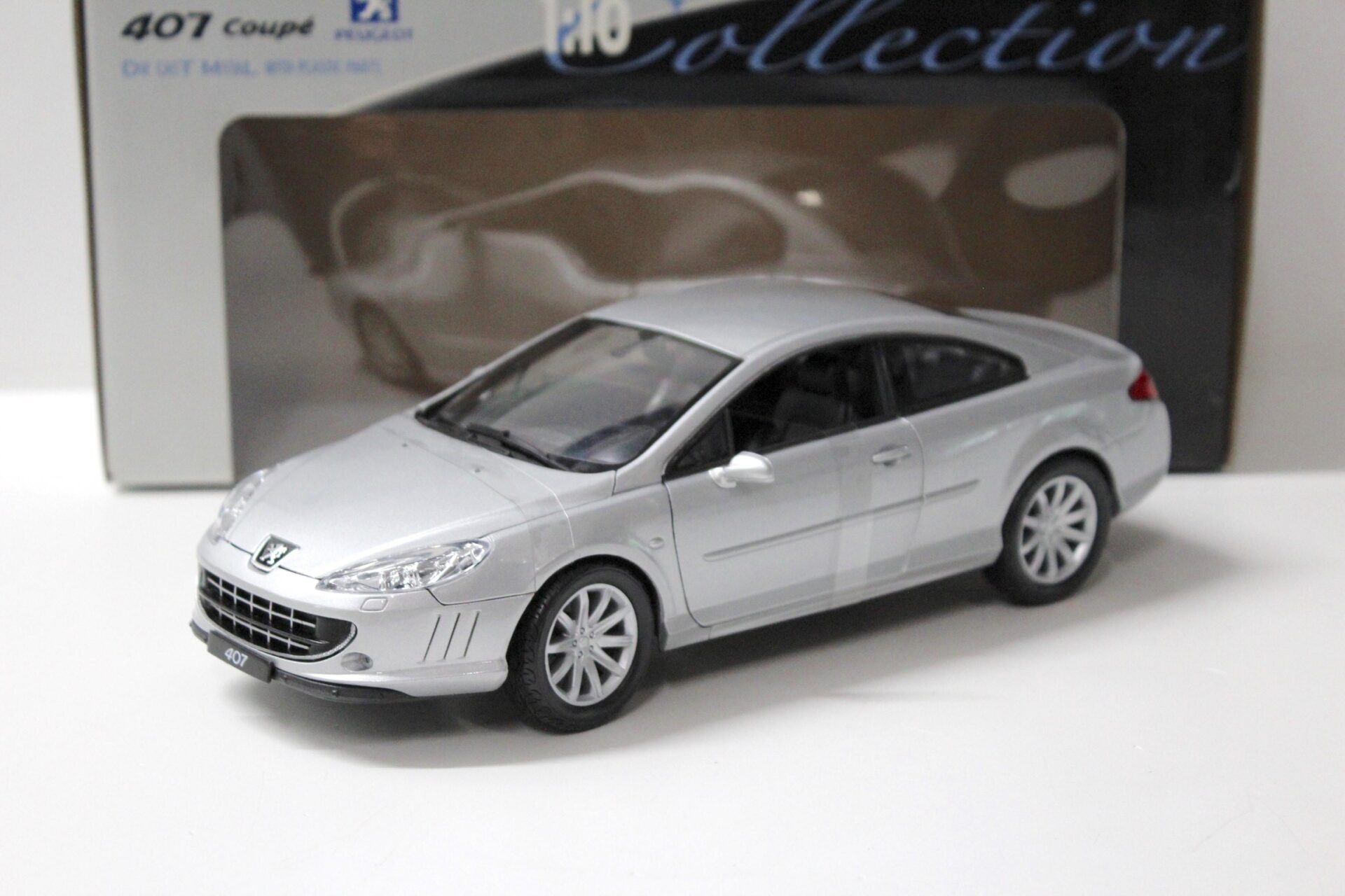 ID 57537 orig.jpg 1:18 Welly Peugeot 407 Coupe silver metallic
