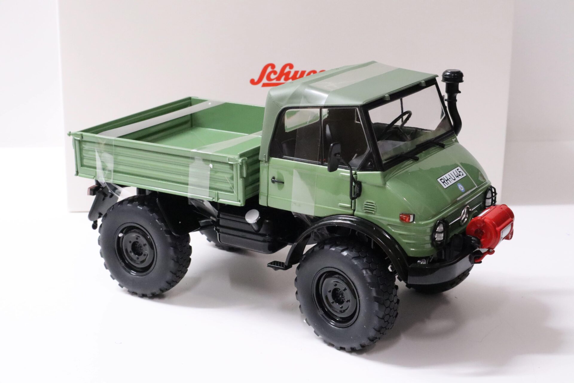 1:18 Schuco Mercedes Unimog 406 Cabriolet with Softtop green