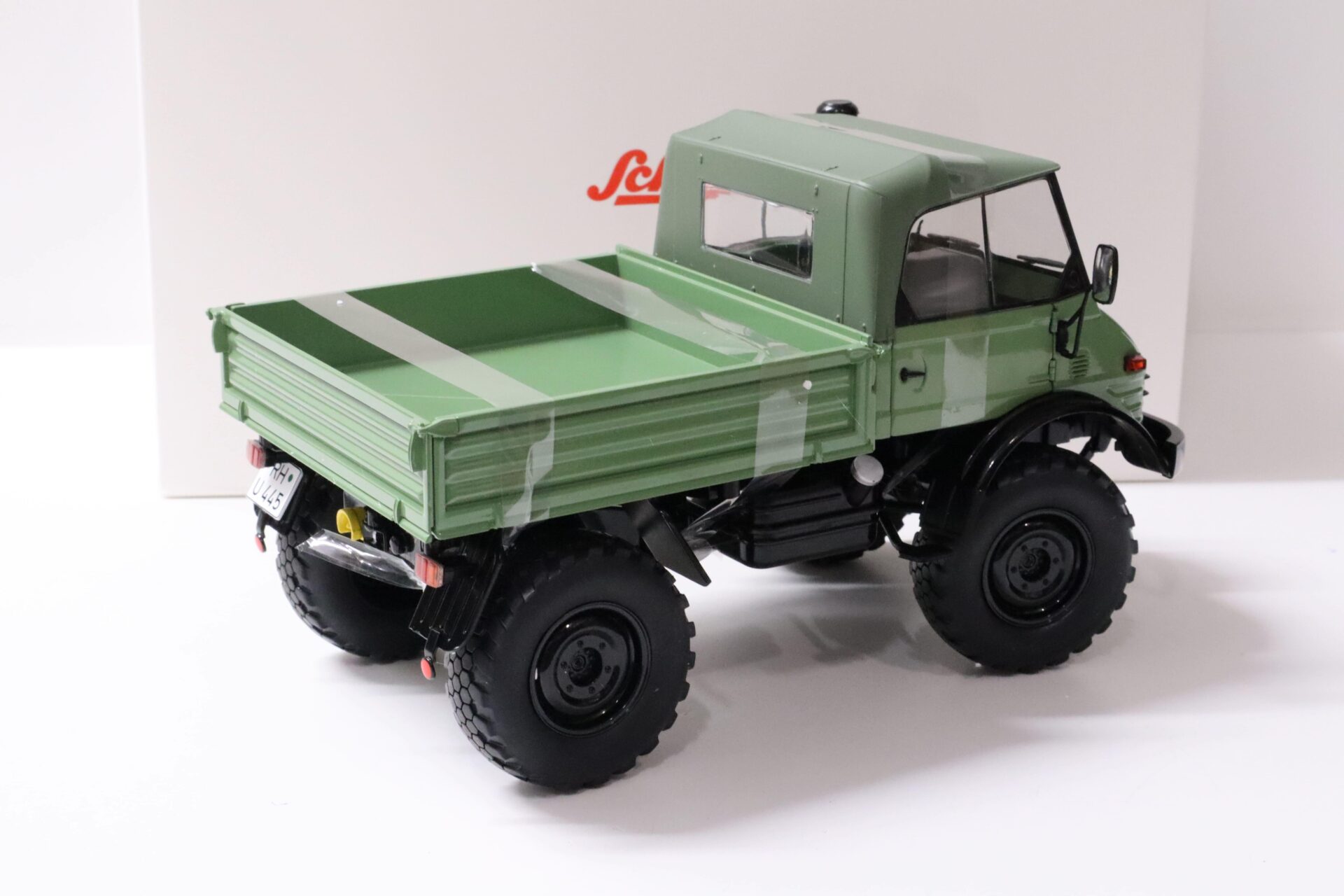 1:18 Schuco Mercedes Unimog 406 Cabriolet with Softtop green