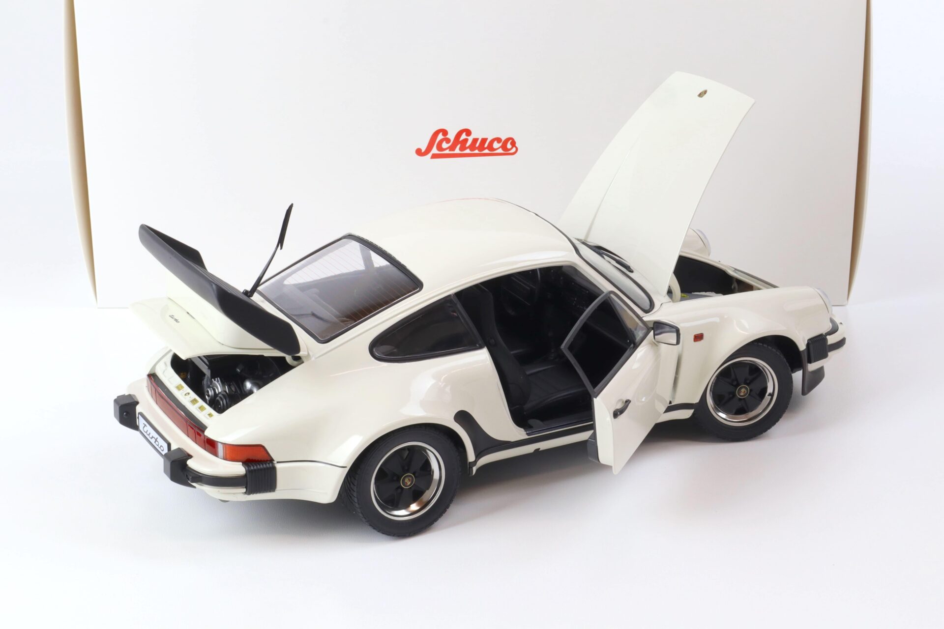 1:12 Schuco Porsche 911 930 Turbo Coupe grandprix white/ black