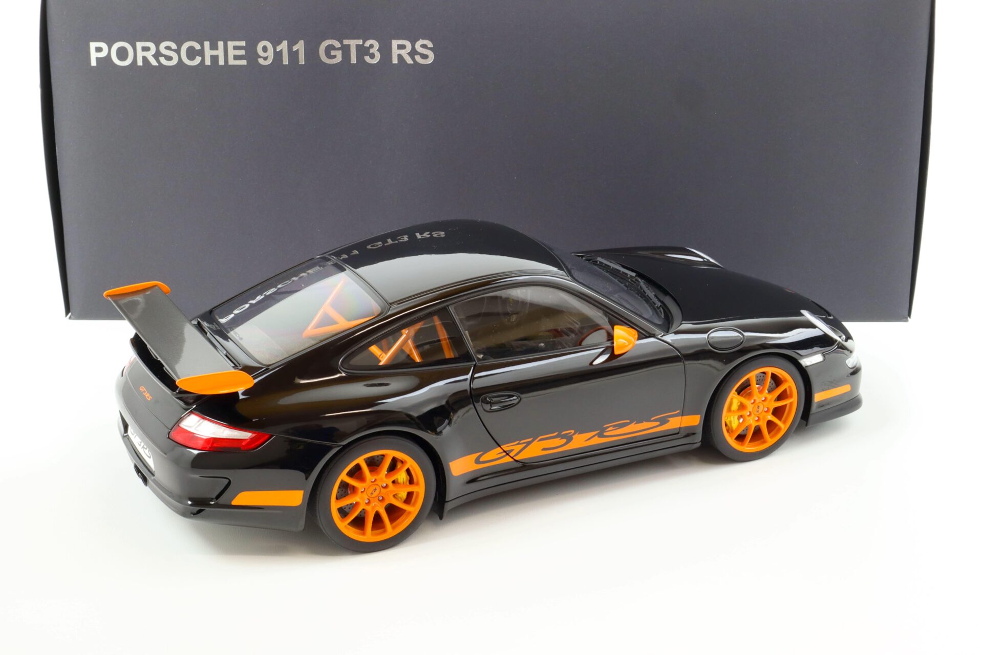 1:12 AUTOart Porsche 911 (997) GT3 RS black with orange stripes 12116