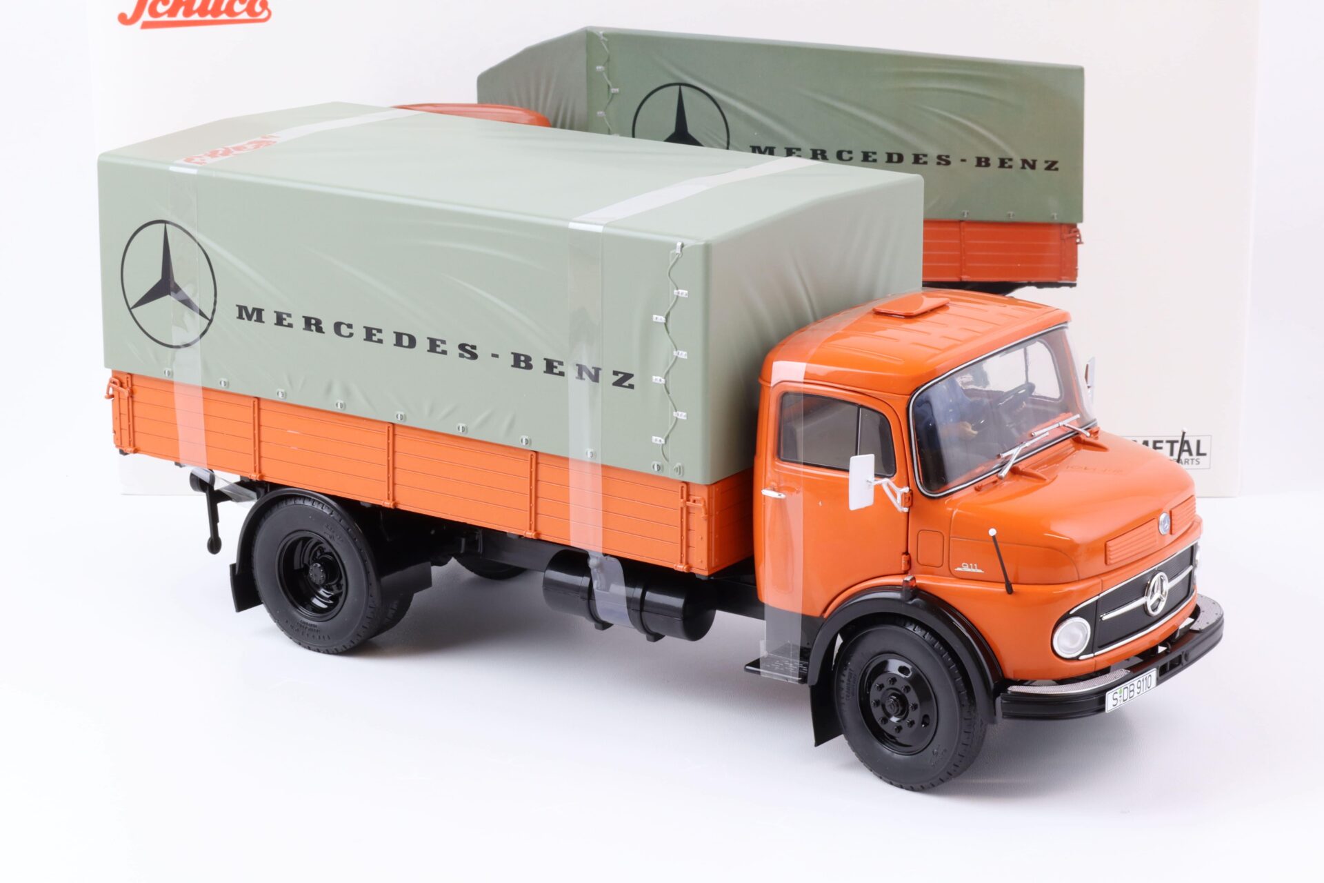 1:18 Schuco Mercedes L911 Pritsche + Plane LKW MHI Edition orange Die-Cast
