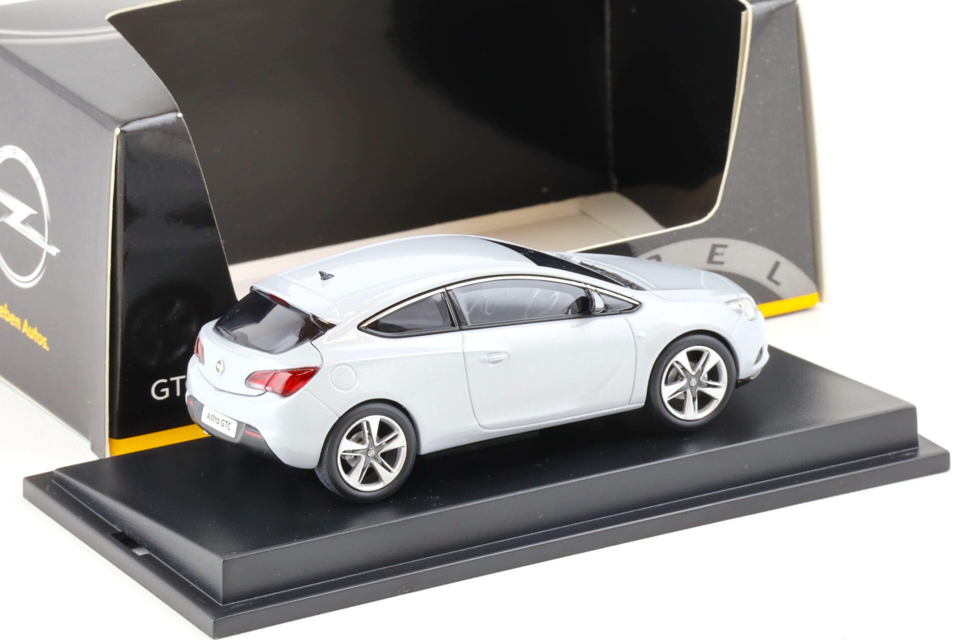 1:43 Motorart Opel Astra J GTC Mineral white DEALER VERSION