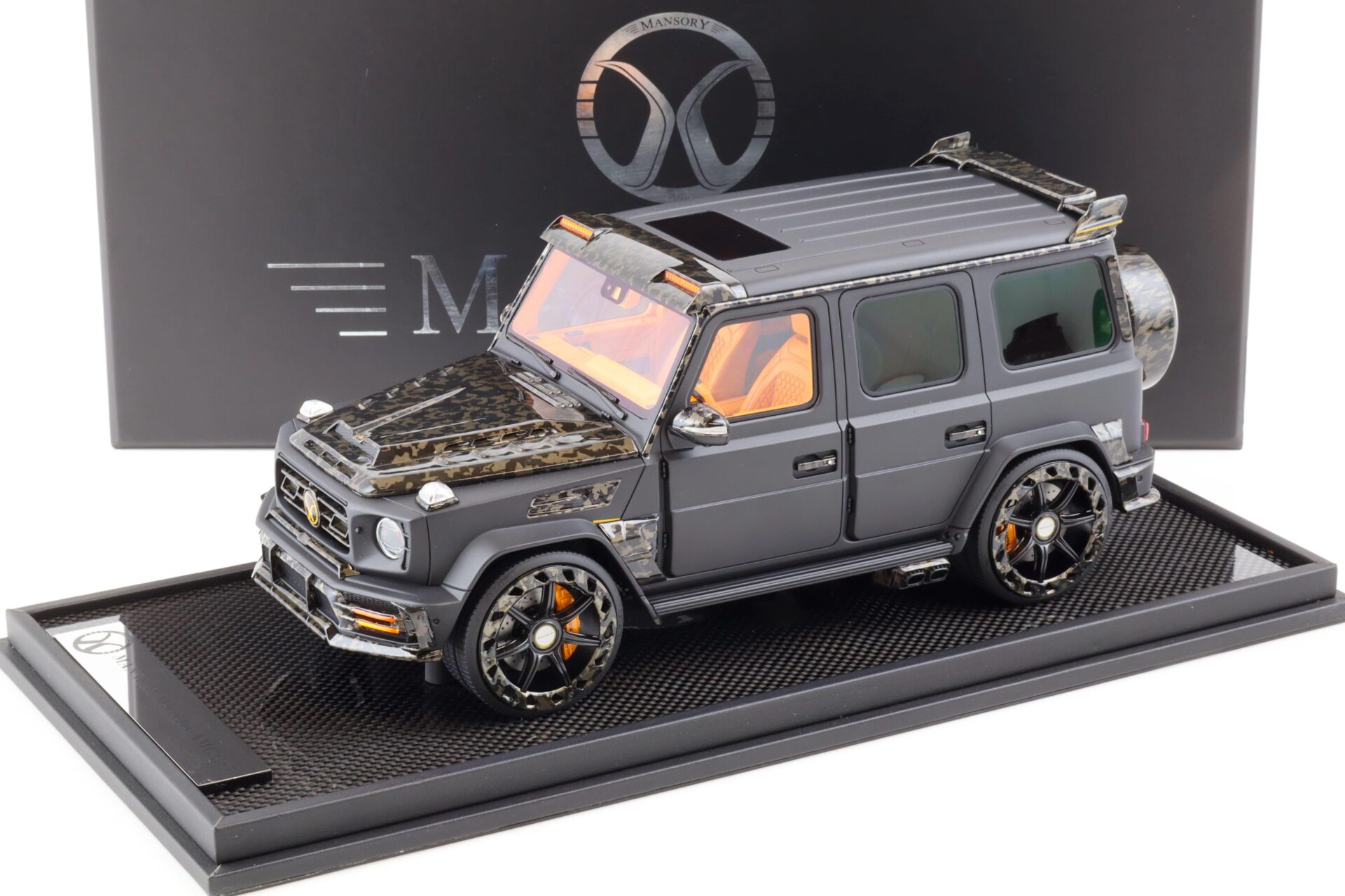 ID 81724 orig.jpg 1:18 Motorhelix Mercedes G-Class G63 AMG Mansory matt black - Limited 149 pcs.