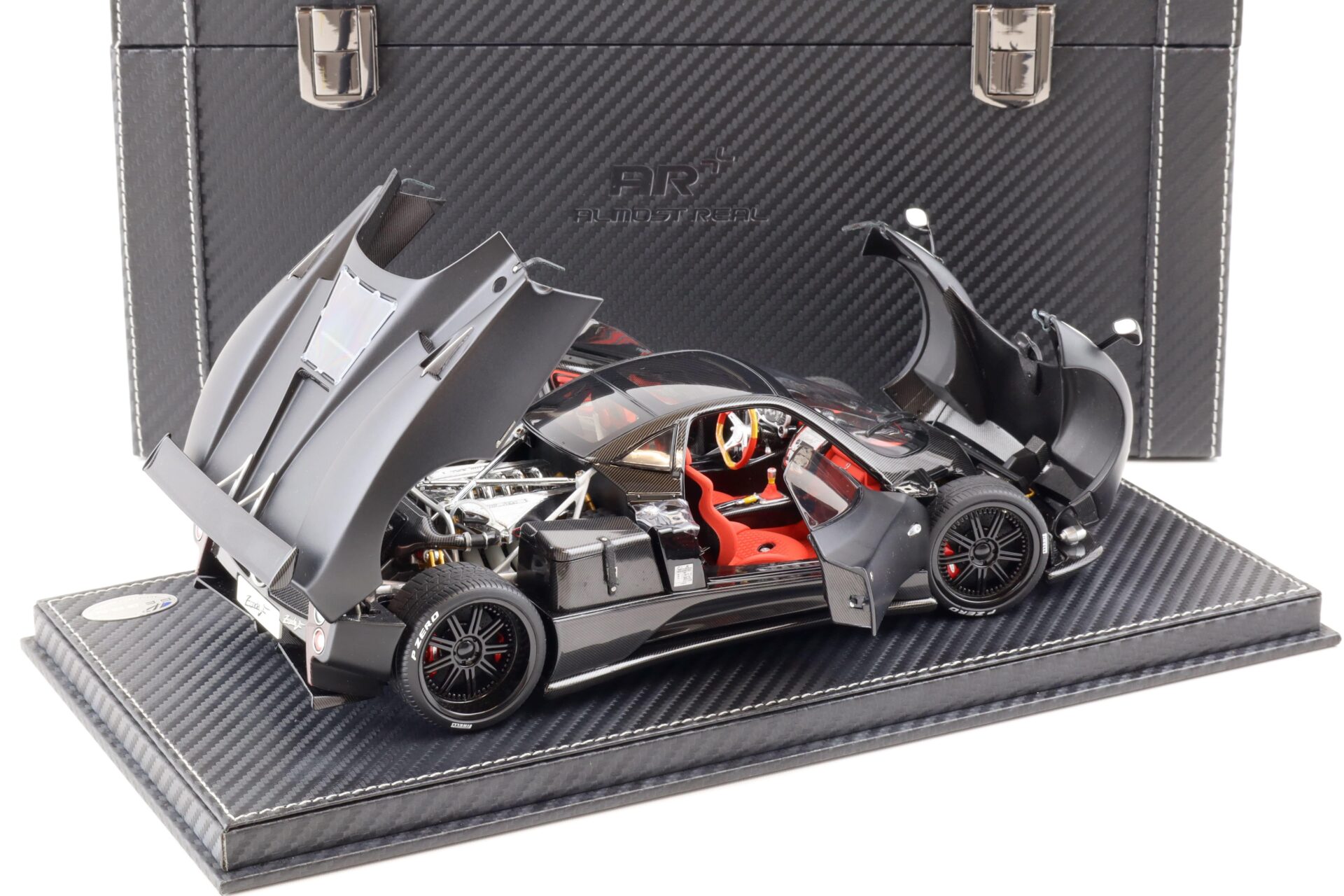 1:18 BBR Almost Real Pagani Zonda F matt black with suitcase - Limited 50 pcs.