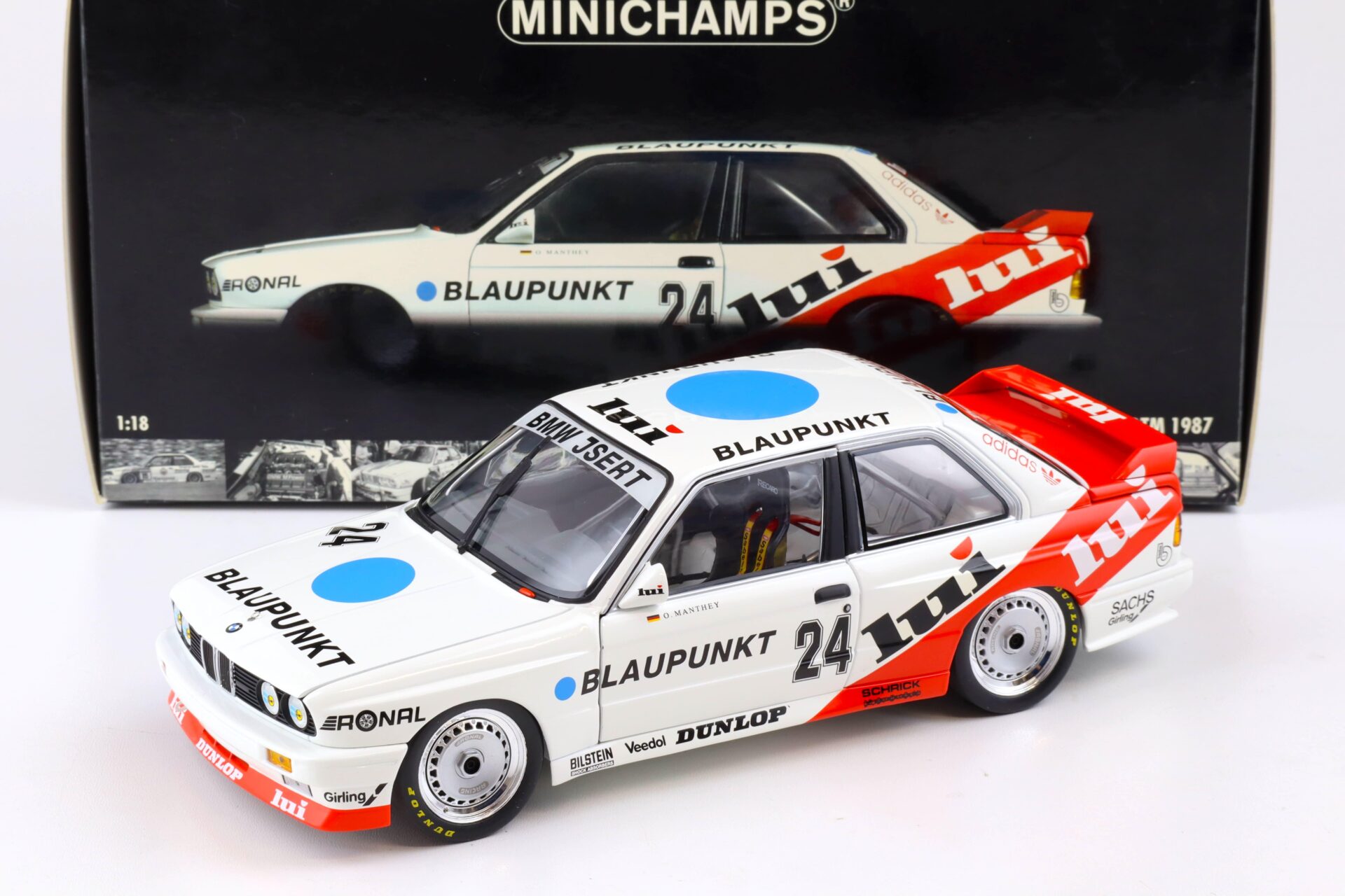 1:18 Minichamps BMW M3 E30 DTM 1987 O.Manthey Blaupunkt #24