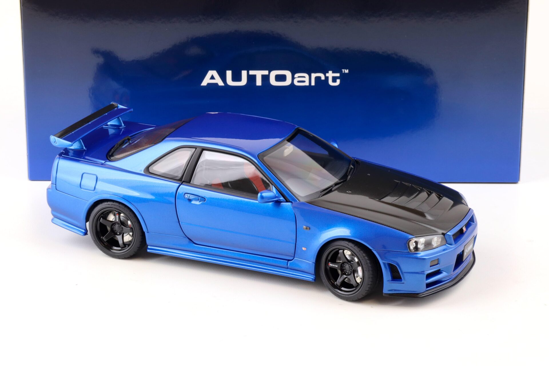 1:18 AUTOart Nissan Skyline GT-R (R34) Z-Tune 2005 Bayside blue/ w Carbon Bonnet 77460