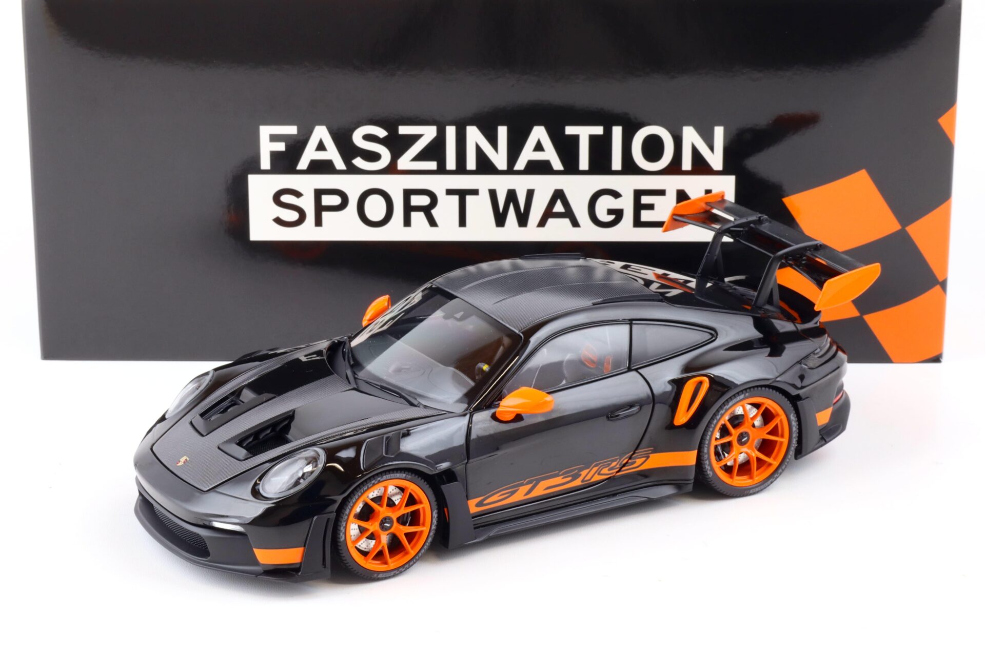 ID 87703 orig.jpg 1:18 Minichamps Porsche 911 (992) GT3 RS Weissach Package 2023 black/ orange