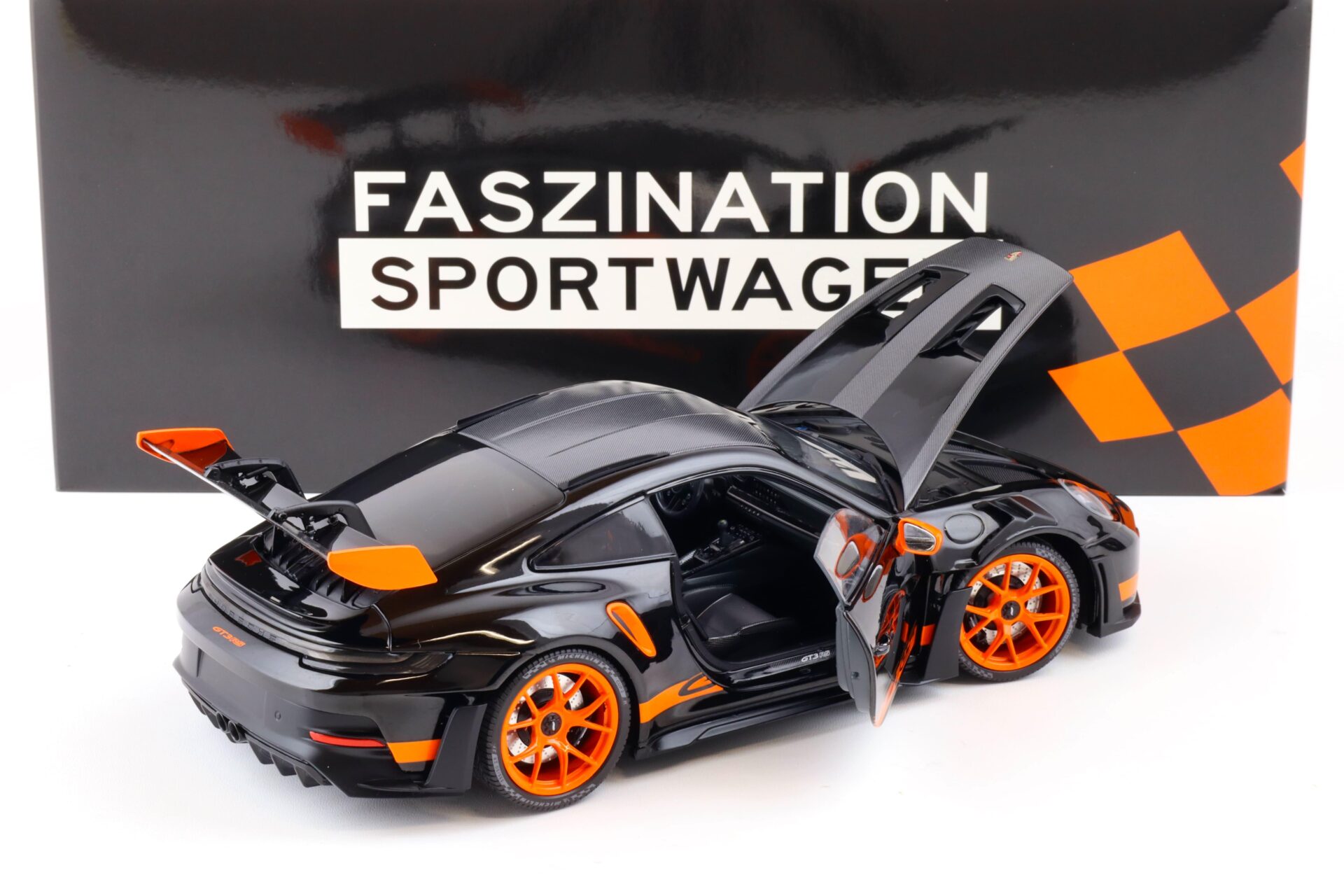 1:18 Minichamps Porsche 911 (992) GT3 RS Weissach Package 2023 black/ orange