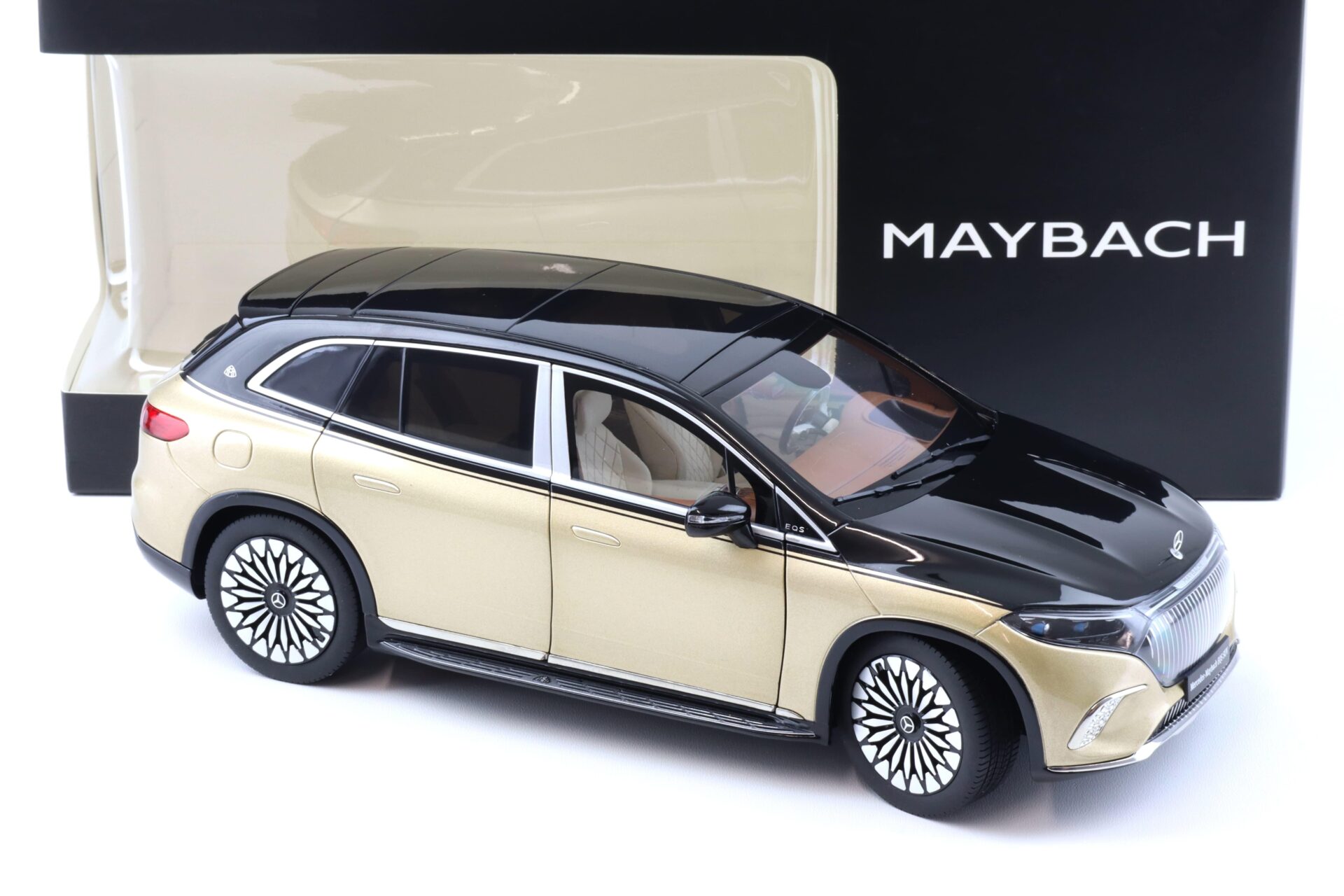 1:18 NZG Mercedes Maybach EQS 680 SUV black/ Kalahari gold DEALER VERSION